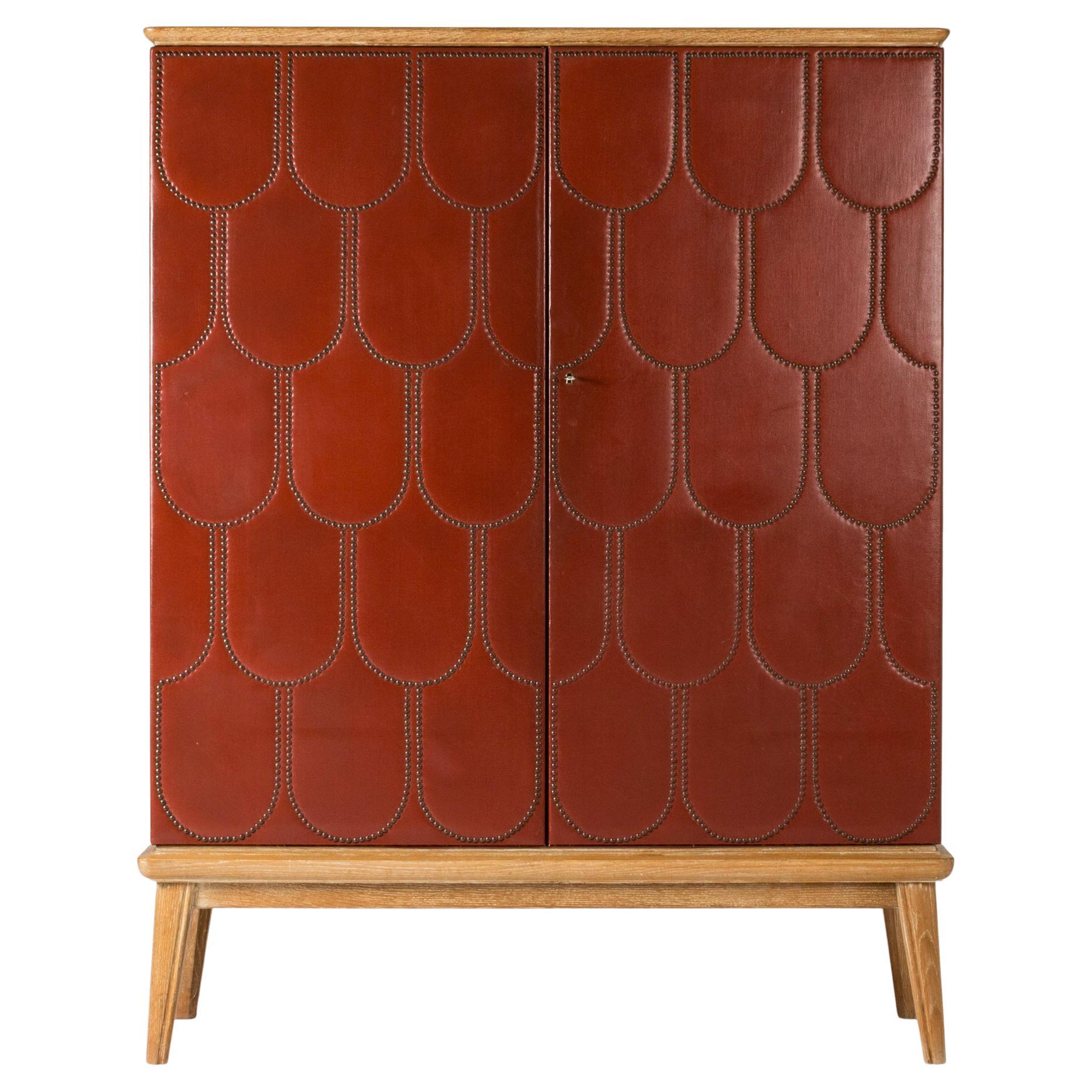 Modernist faux leather cabinet by Otto Schulz, Sweden, 1950s