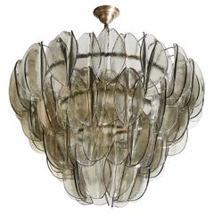 Lustre moderniste en forme de plumes en verre de Murano fumé topaze et bronze huilé