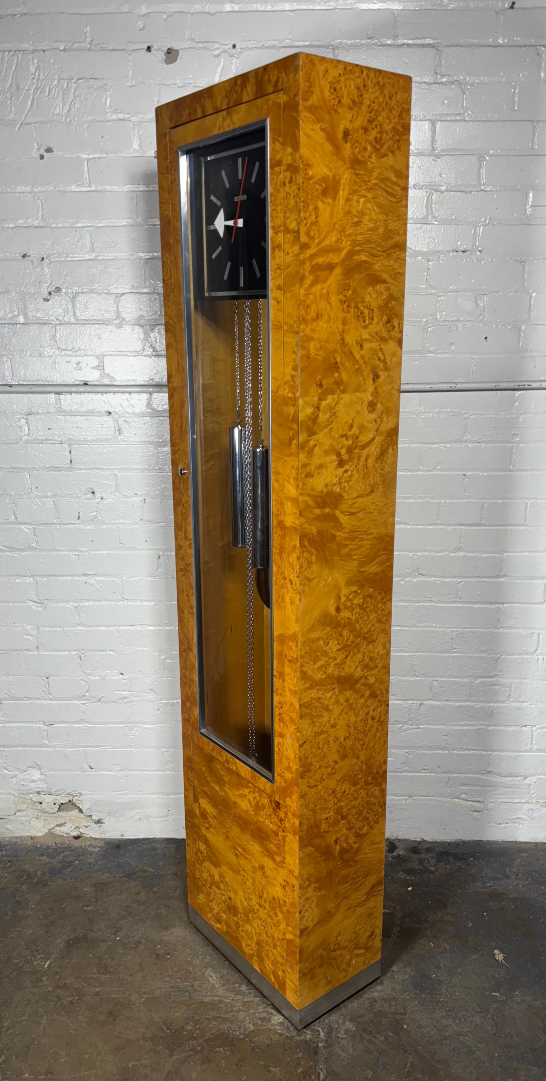 American Modernist Floor Clock  by Howard Miller / stunning Burl Olive Case For Sale