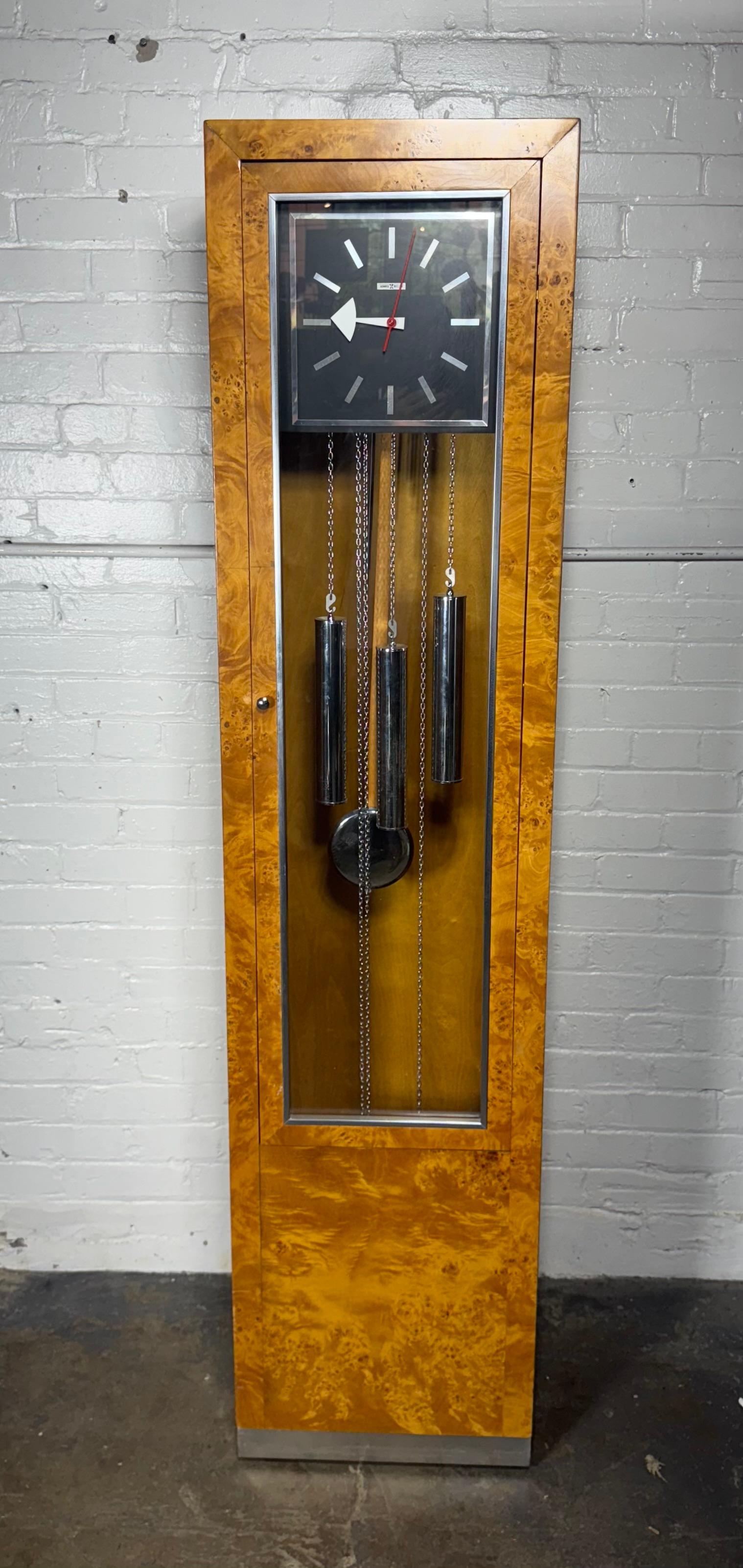 Late 20th Century Modernist Floor Clock  by Howard Miller / stunning Burl Olive Case For Sale
