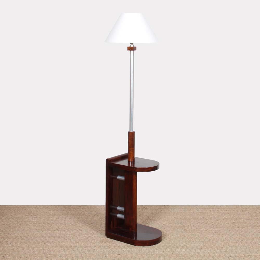 This modernist floor lamp in wood and chromed metal is attributed to DIM (Décoration Intérieur Moderne). It dates from the 1930s. This shelf light is in good condition.
