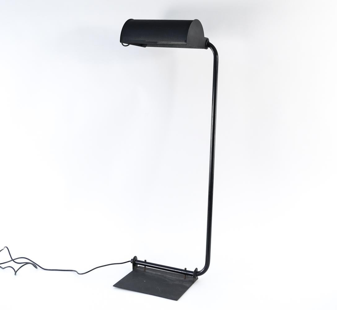 A black industrial style floor lamp with clean, modern lines.