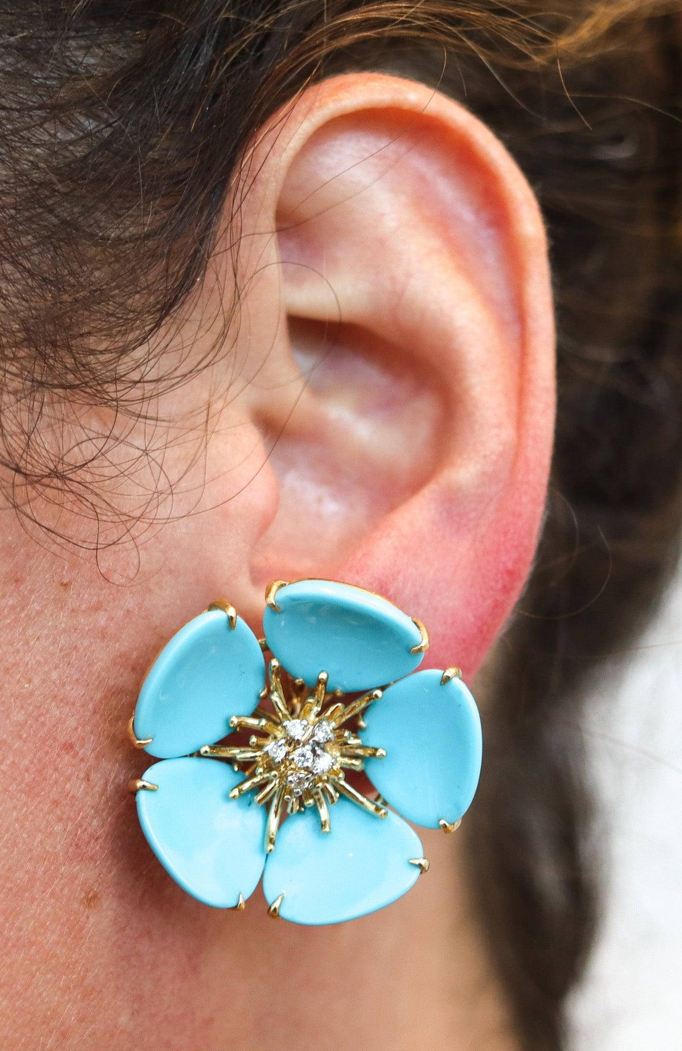 Italian pair of modernist flower clips-on earrings with turquoises.

These are a contemporary, colorful and youthful flowers clips-on earrings created in Italy. The contemporary earrings were carefully crafted in the shape of stylized five-petals