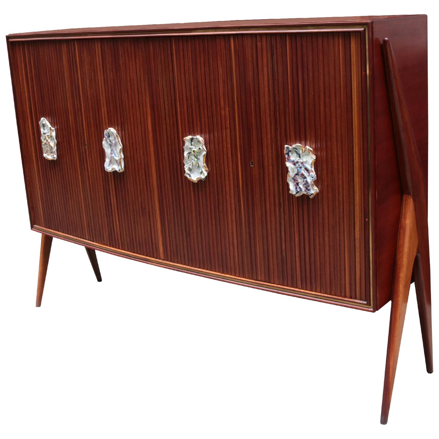 Modernist Four Door Cabinet by Oswaldo Borsani For Sale