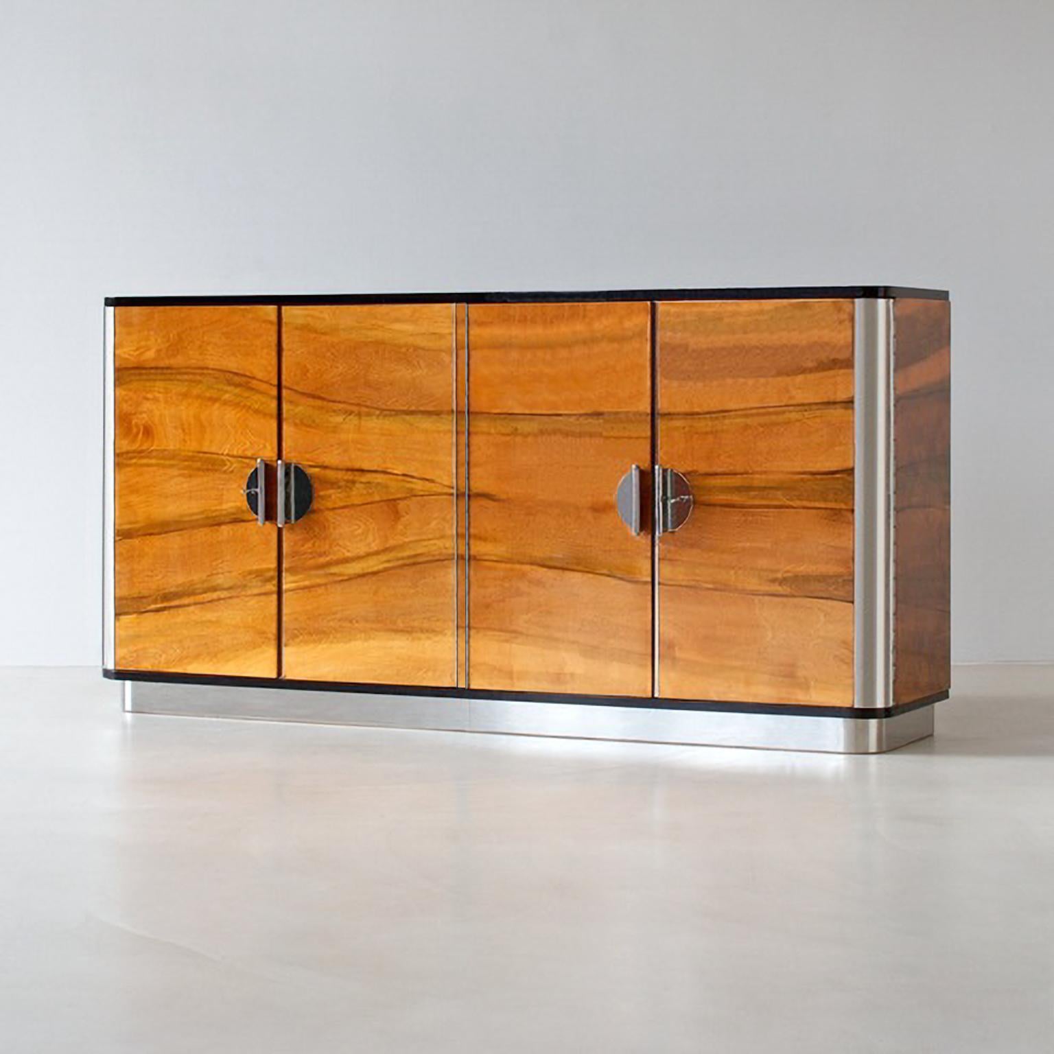 Bespoke modernist four-door sideboard, veneered wood, chrome plated metal.

