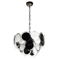 Modernist Four Tier Black and White Hand-Blown Murano Disk Chandelier