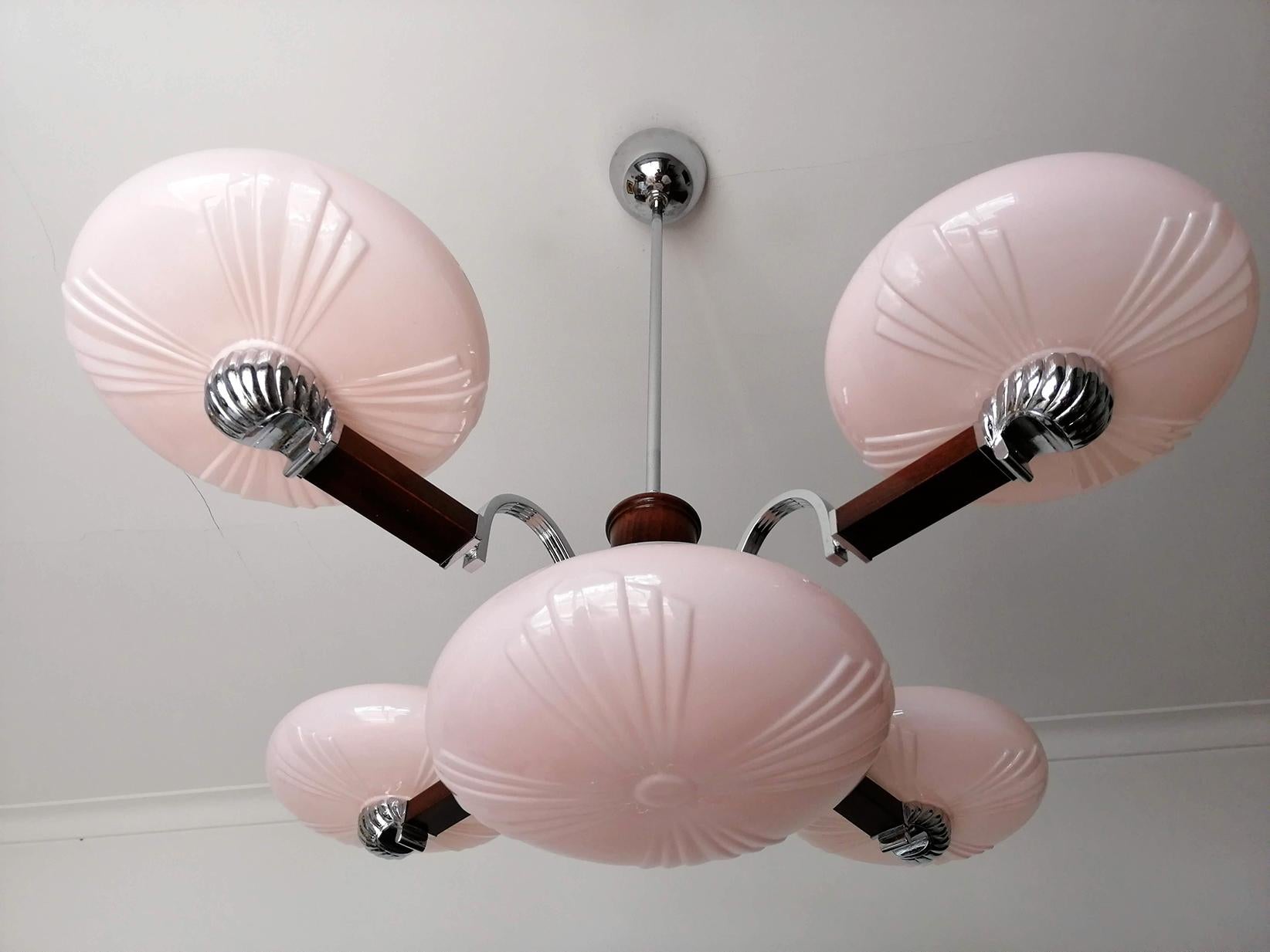 Original French Art Deco modernist ceiling lamp, pink opaline glass shades Bauhaus chandelier
Materials: Opaline glass/ wood/ chrome
Measures:
Diameter: 31.5 in / 90 cm
Height: 35 in / 88 cm 
Glass shades: 10 in / 25 cm 
Glass bowl; 13 in / 33