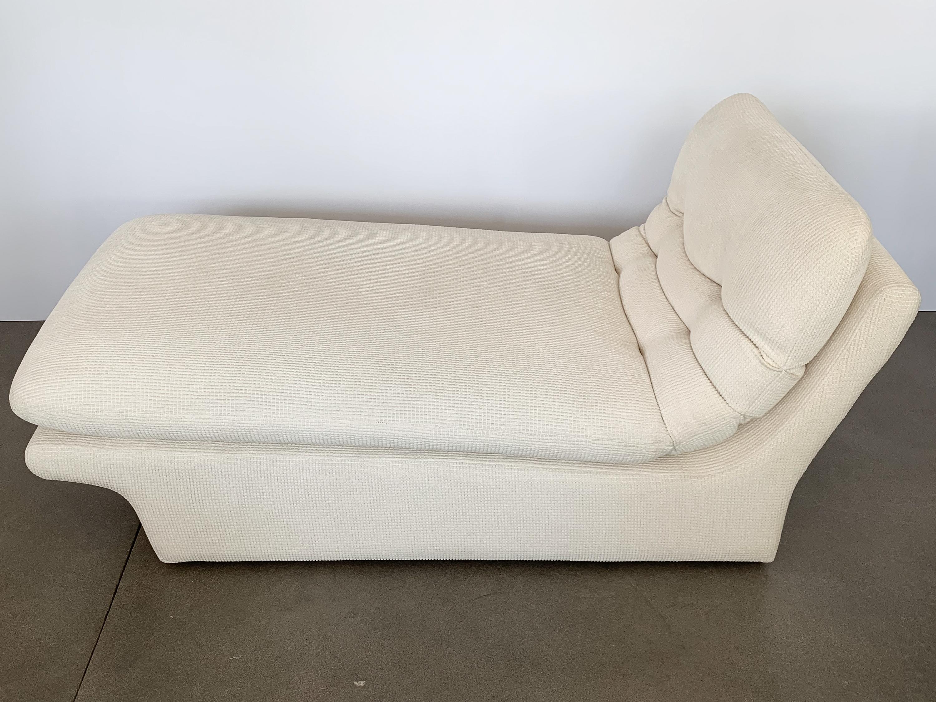 Modernist Kagan style chaise lounge by Preview, circa 1980s. Single loose cushion with channels and tufted buttons sits on a fully upholstered curved sculptural base. This chaise lounge is in very good vintage condition. Light wear and slight fading