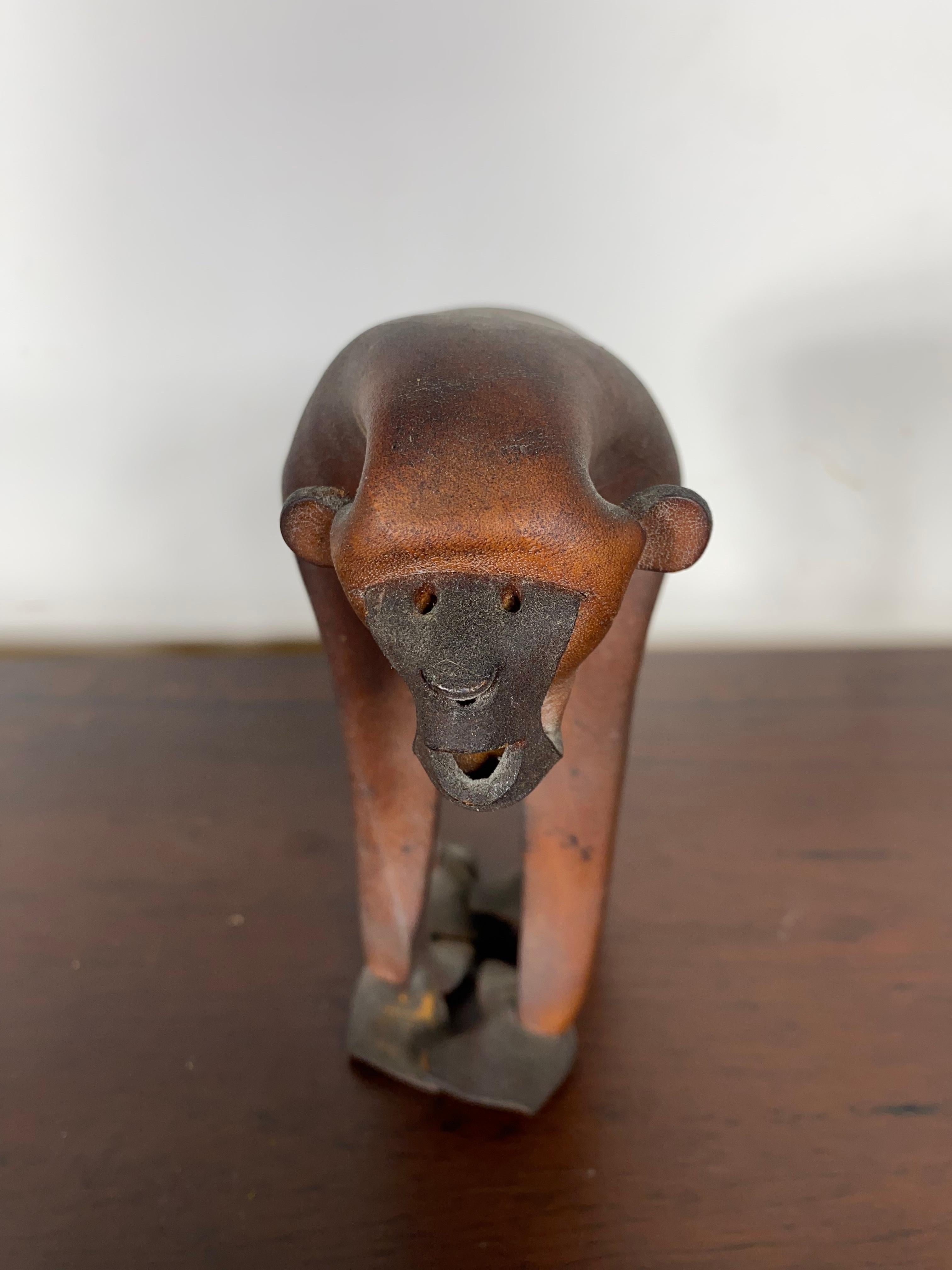 A Handmade German leather monkey sculpture by Deru... signed,, nice early version,, wonderful patina..