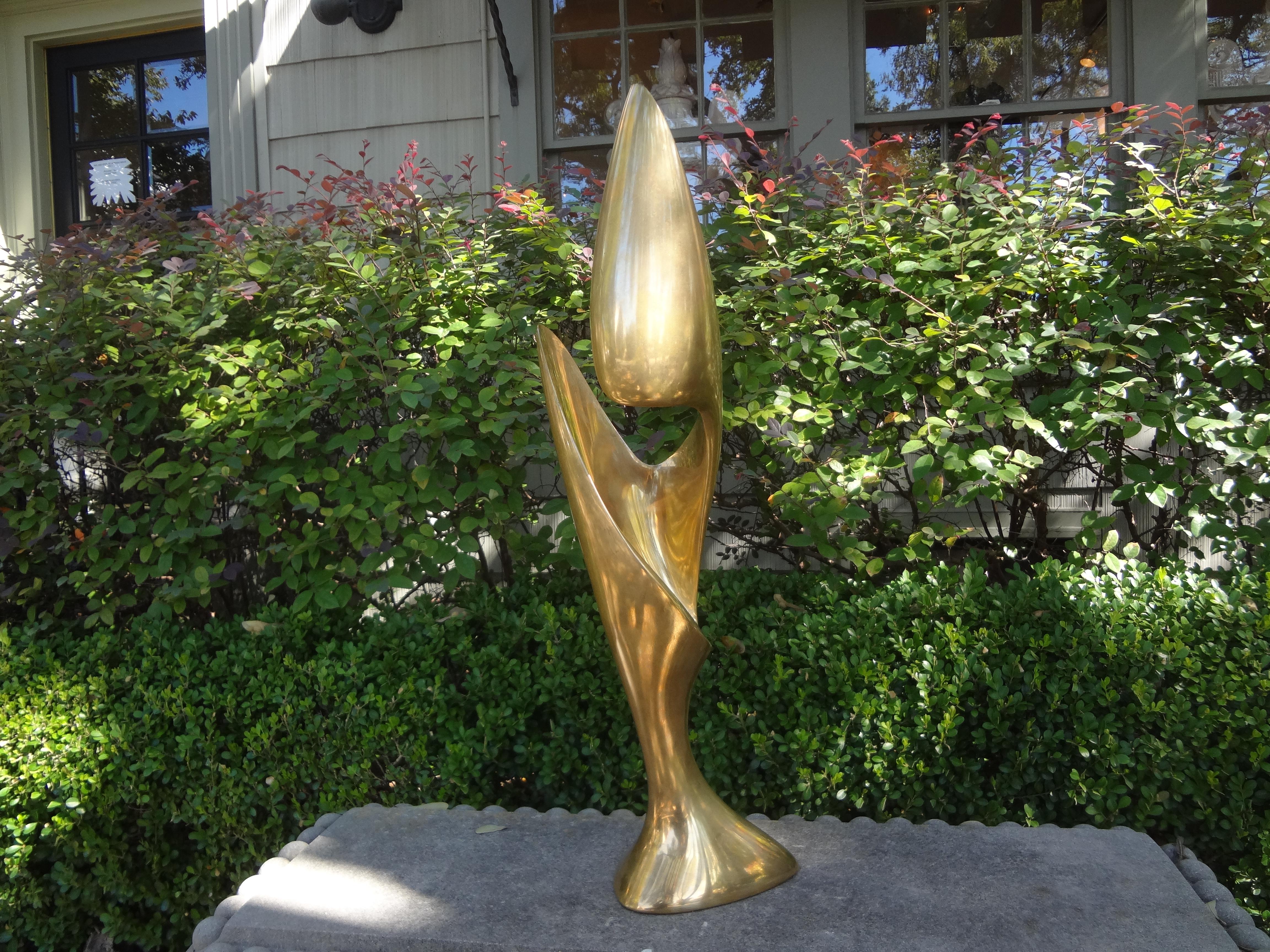 Stunning large modernist gilt bronze abstract sculpture. This fantastic heavy Mid-Century Modern bronze sculpture is great displayed from any angle. Artist-signed P 4/6.