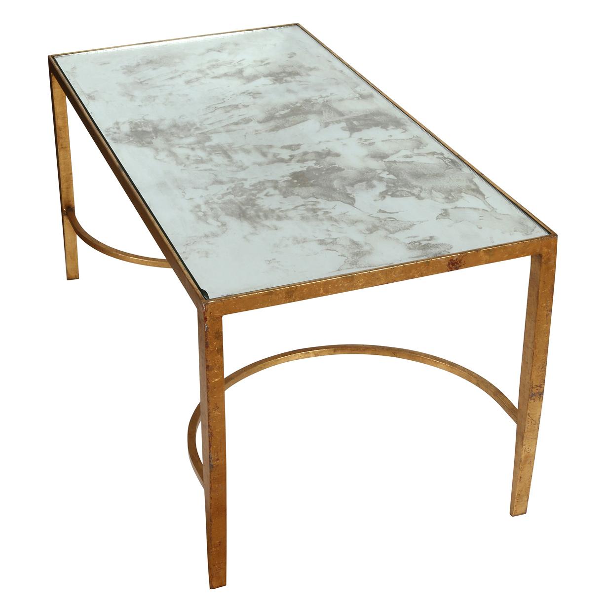 Cette élégante table en fer doré présente un cadre minimaliste et élancé avec une finition dorée chaleureuse et des supports de châssis gracieusement arqués. Surmontée d'une surface en verre miroir fumé, elle allie le charme vintage à une