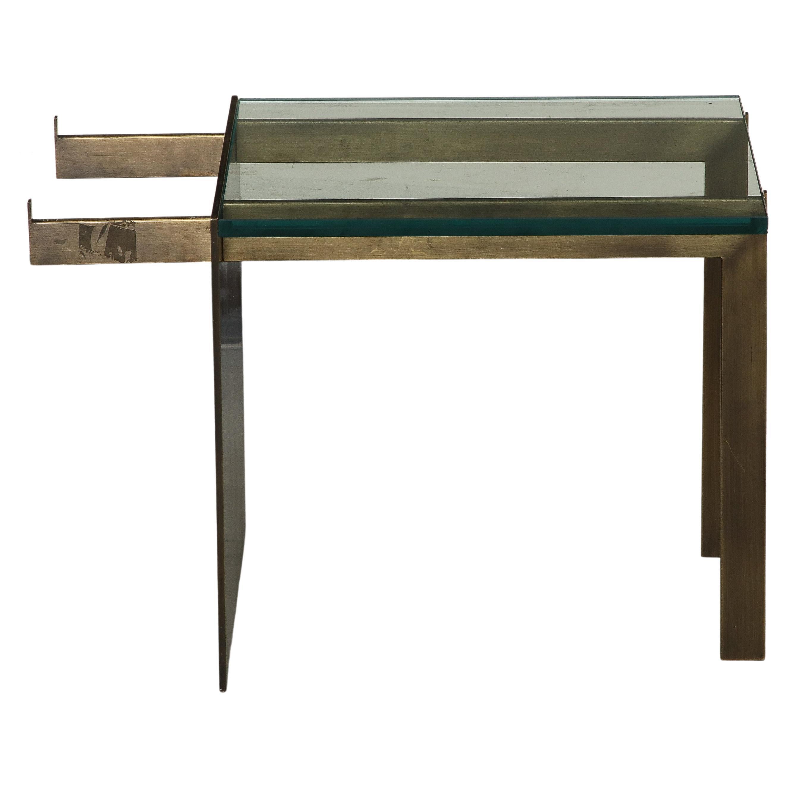 Modernist sculptural bronze and glass coffee table. One side features a flat sheet of bronze in counterpoint to the support and legs opposite. A glass piece could be added to the small section on the other side of the bronze sheet if desired. 
