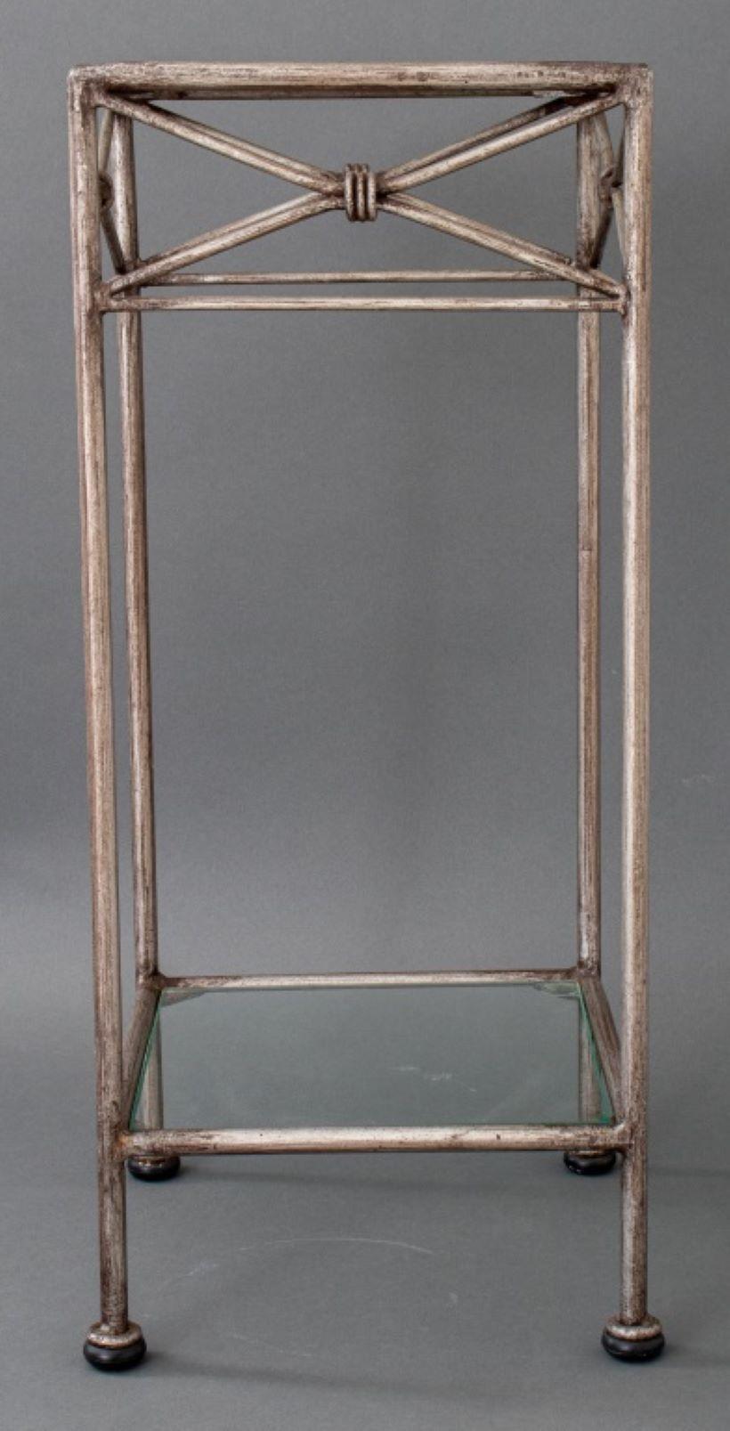 Modernist glass mounted silvered metal side table with a square top.

Dealer: S138XX