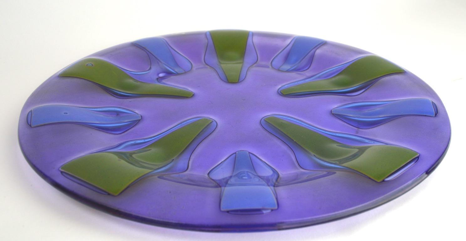 Large glass plate, or charger, by recognized midcentury master Higgins (Michael and Francis). Nice clean signed example, free of damage or condition issues.