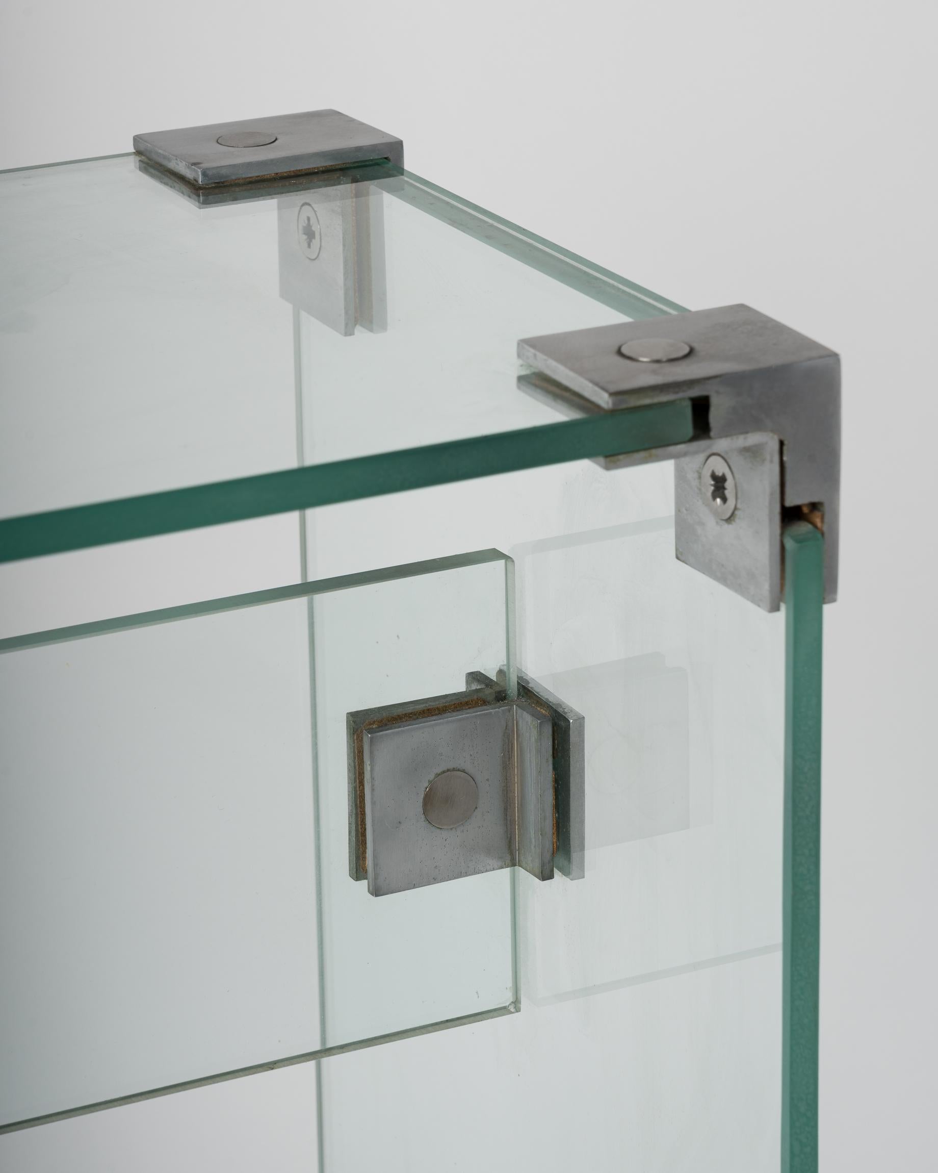 Modernistischer Glas-Beistelltisch m. Stahlglieder aus Stahl von Jacques Dumond, Frankreich, 1960er Jahre (Edelstahl) im Angebot