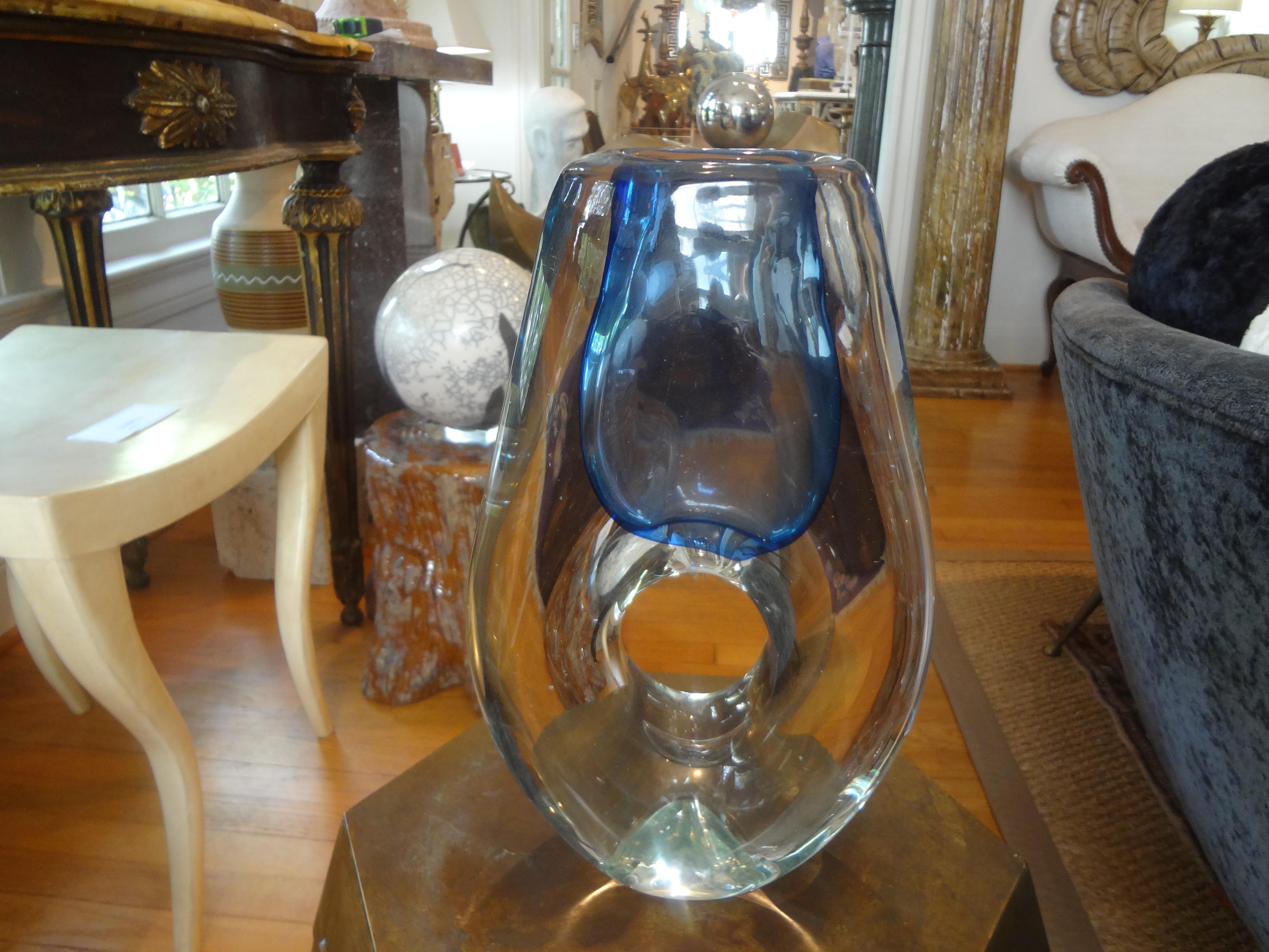 Modernist glass vase or sculpture. This Stunning Cased Glass Vase Or Sculpture Is Executed In A Clear Glass With An Interesting Hole And Terminating In A Beautiful Blue. Gorgeous Modernist Accessory!.