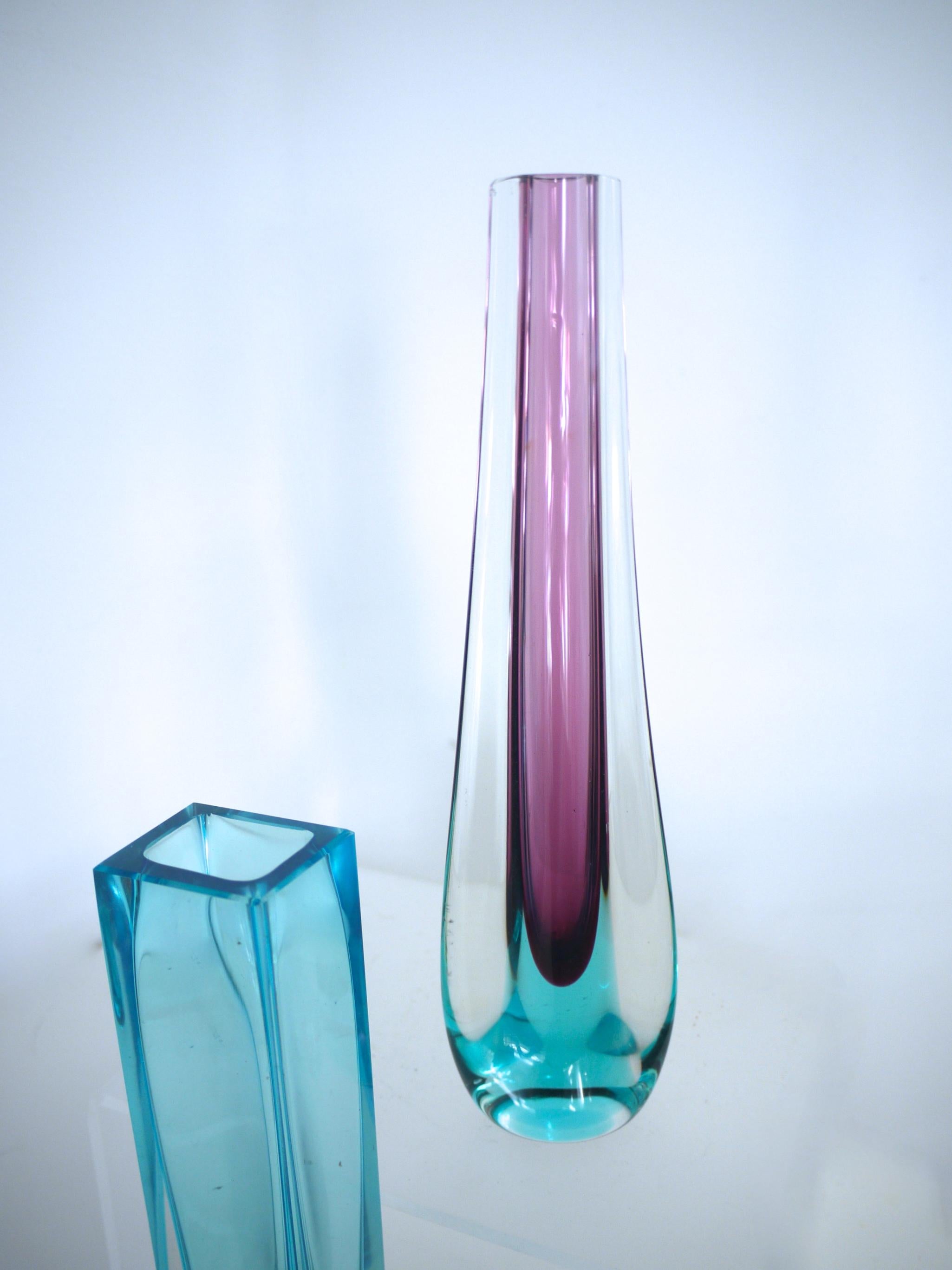 Modernist glass vases Murano teardrop by Ferro and 'Block' Vase by Nuutajarvi.
Pair of Scandinavian Modernist Glass Pillar Vases by Nuutajarvi Notsjo 

Nuutajarvi Notsjo was established in 1793, in Urjala, Finland, . Nuutajarvi merged with