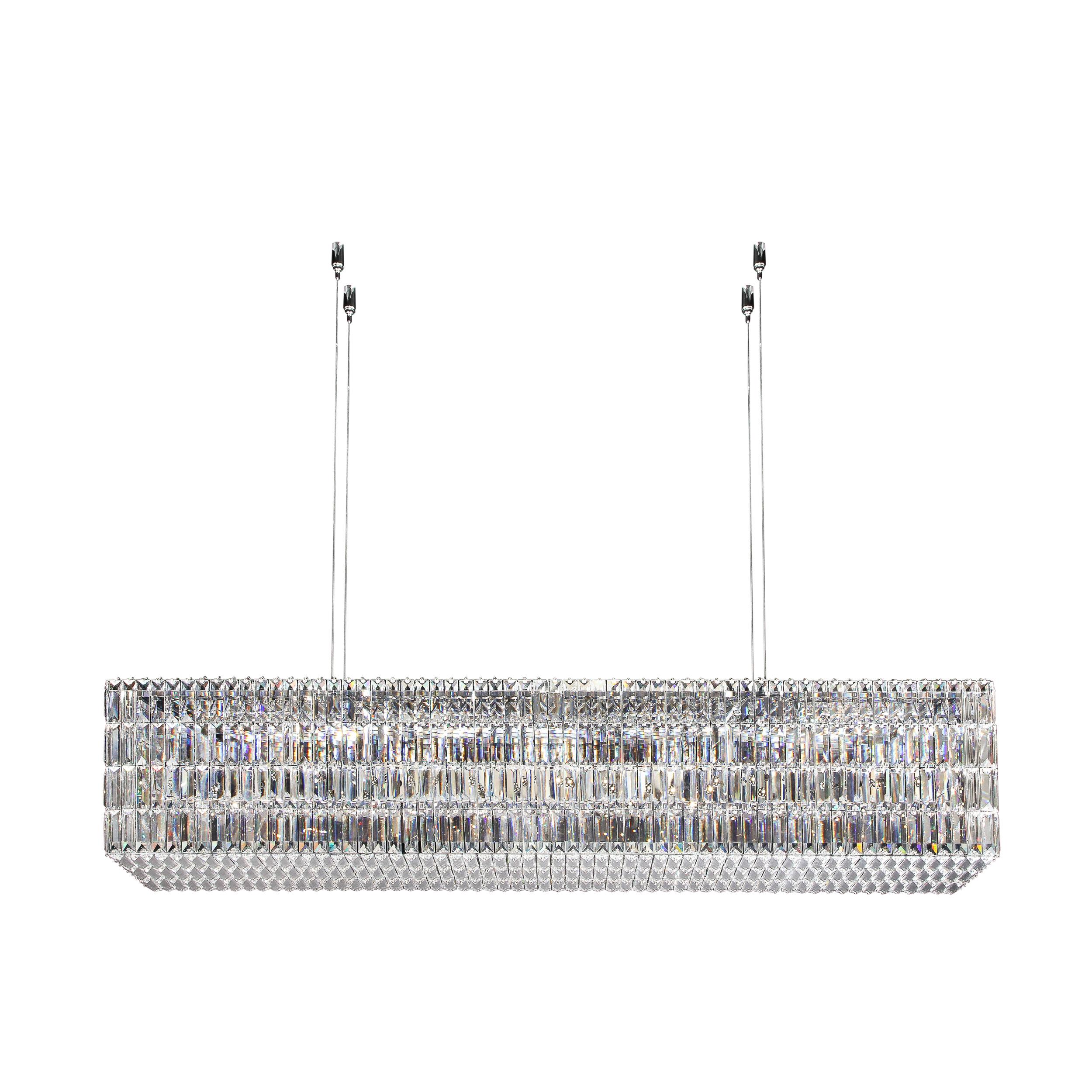 This jaw dropping chandelier was realized by the illustrious crystal company Swarovski- one of the world's premiere luxury brands- in Austria circa 2009. The piece features a volumetric rectangular form of faceted crystals like a sea of shimmering