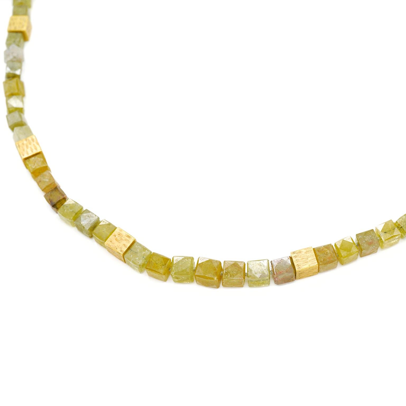 Circa 1990s, 22k, American.   Spectacular Post-Modern necklace of green and silver-hued natural diamond beads interspersed with 22k elements. This one-of-a-kind necklace features custom-cut cube motif diamonds with each side faceted for superb play