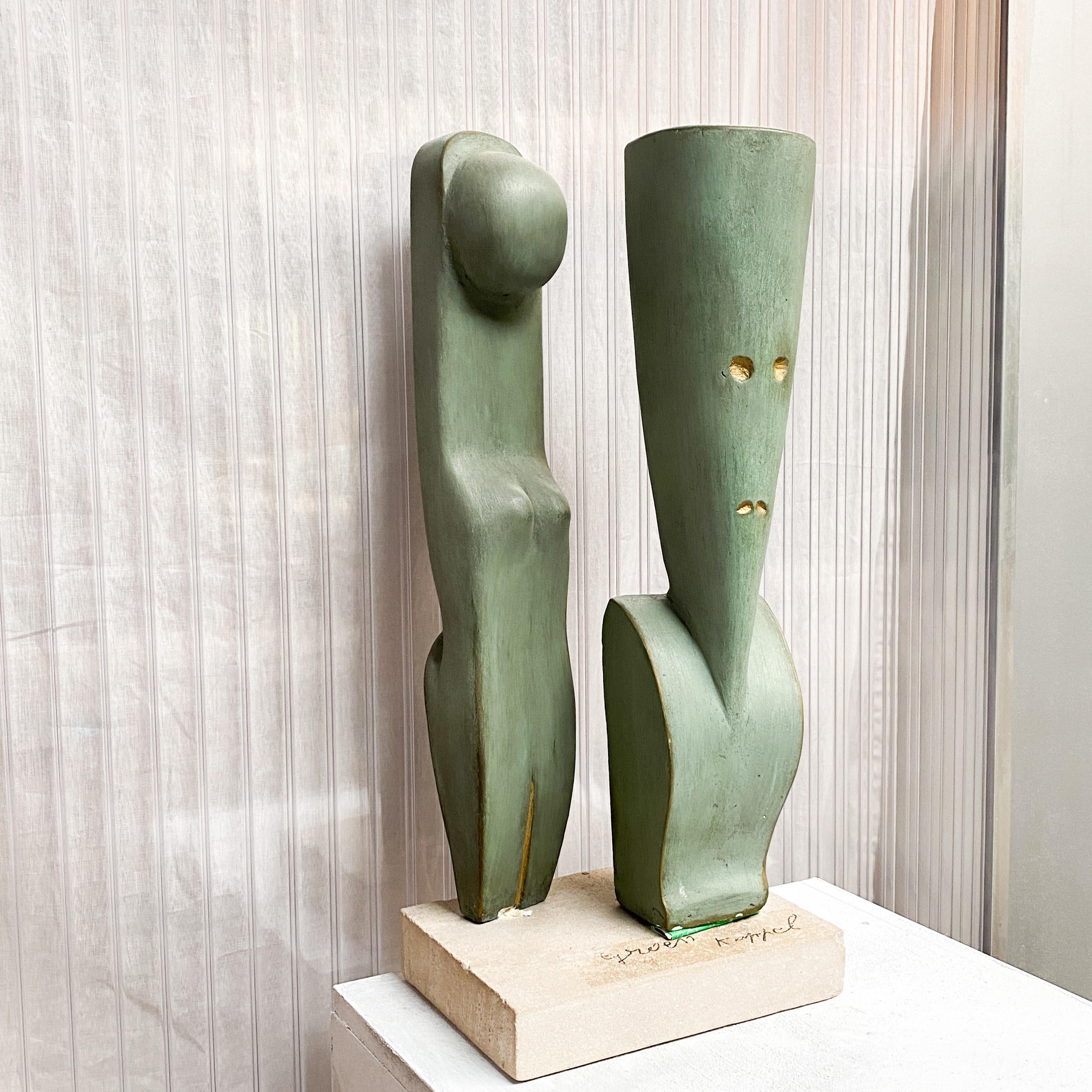 Interesting modernist gypsum sculpture of a stylized couple. Made by an unknown Belgian artist.

An intruding pair of abstract shapes, one representing a female form, one a man. Stylized shapes, reminiscent of ancient Egyptian sculptures. Hand