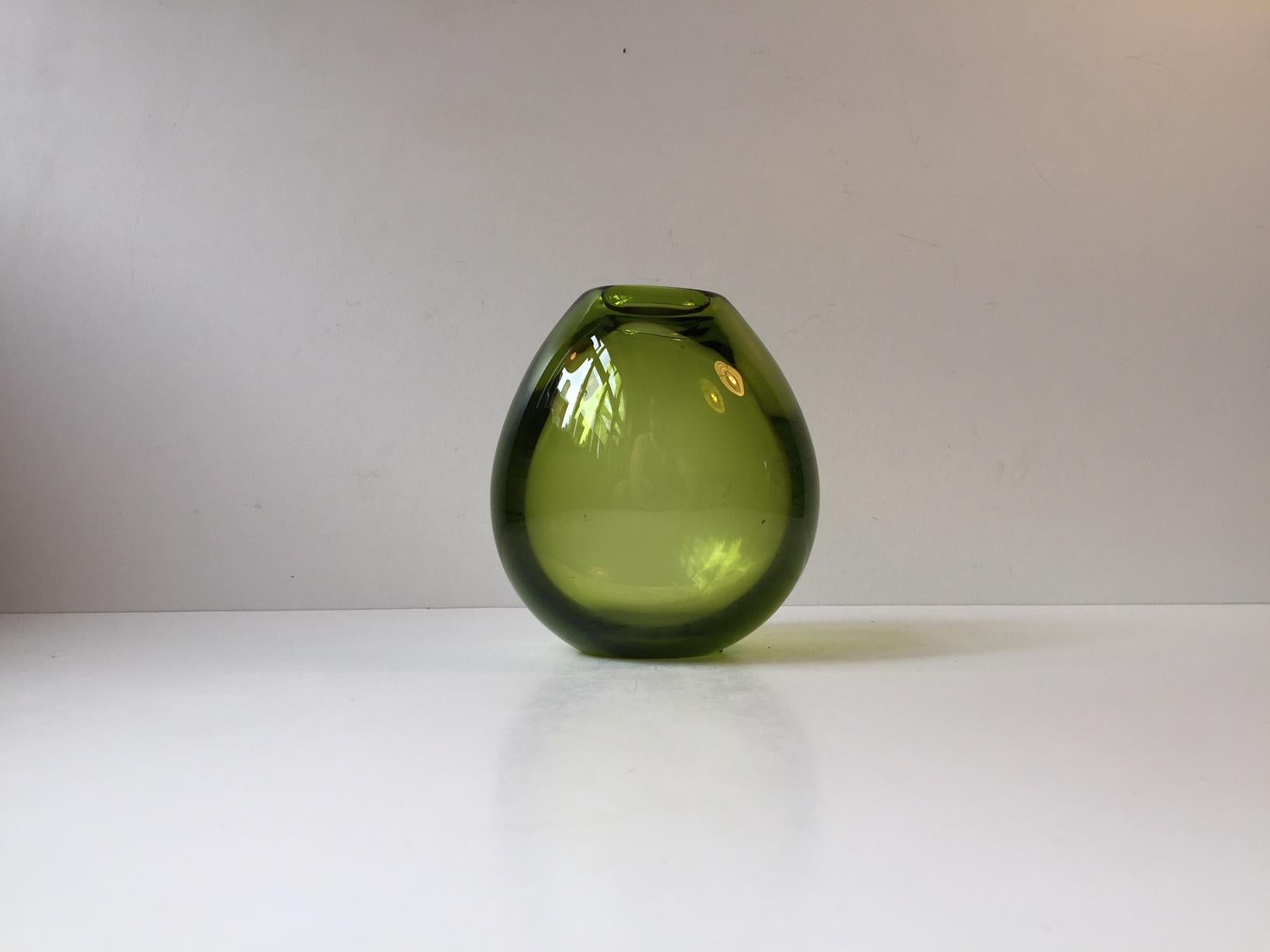 A 1960s Holmegaard Per Lutken 'May' green teardrop shaped vase, signed to base 'Holmegaard', numbered and with Per Lütken initials.