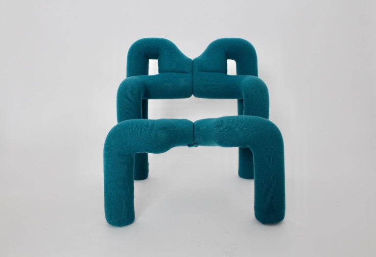 A sculptural design in a bold green color, this presented armchair named Ekstrem designed by Terje Ekstrom 1972 and executed by Stokke Norway 1980s is an early vintage example which is new covered with a green woolen fabric. Furthermore the very
