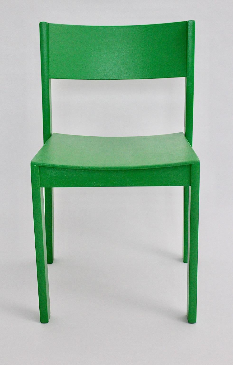 Modernist Mid-Century Modern twelve ( 12 ) vintage dining chairs from beech in green color designed and manufactured 1950s Austria.
A fabulous set of twelve dining chairs from beech newly lacquered in bold green color with a stackable feature.
These