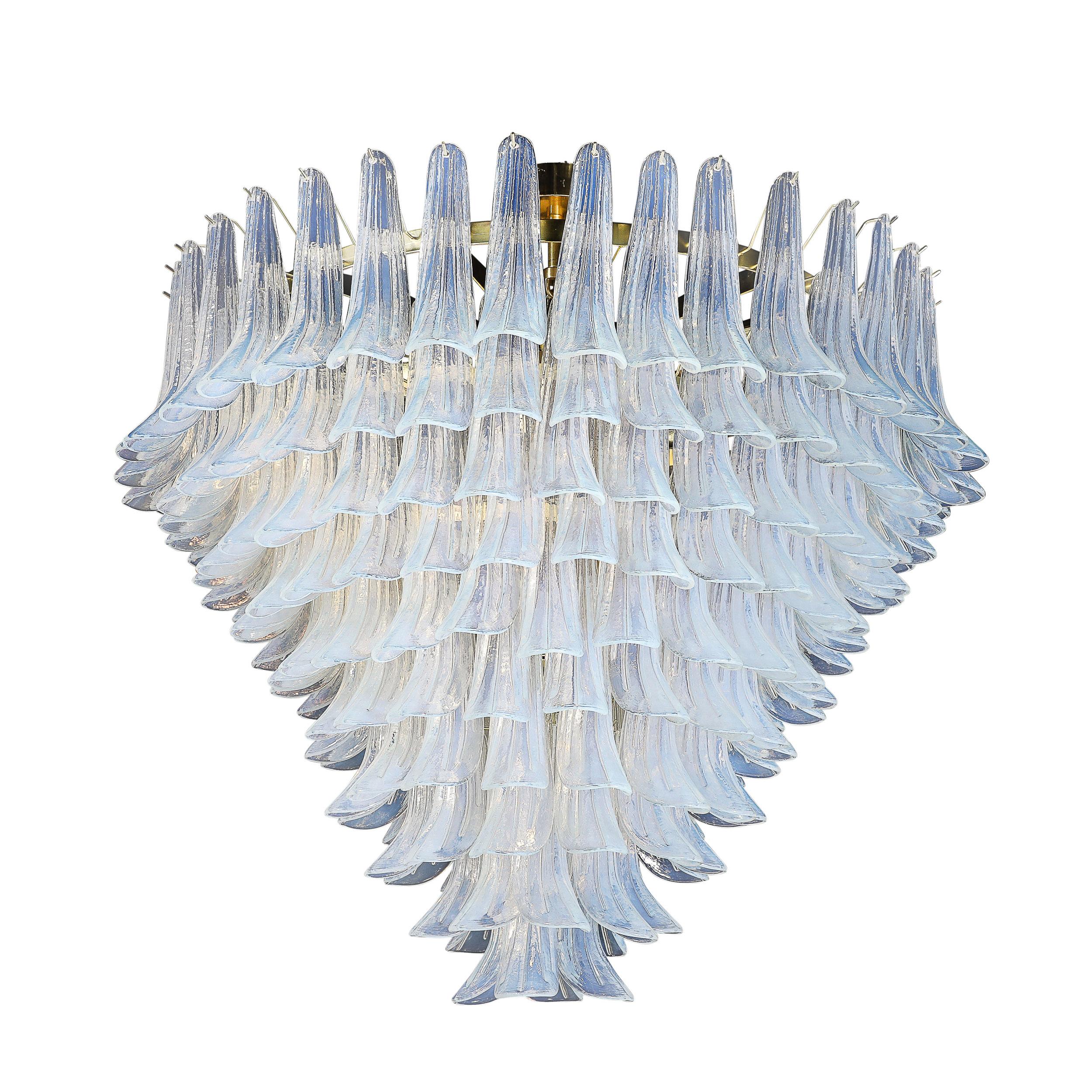 This stunning Modernist Hand-Blown Iridescent Murano Glass Feather Chandelier with Brass Fittings originates from Italy, Circa 2000. Features 10 tiers of iridescent feather glass. These beautifully spaced individual elements are tapered at their