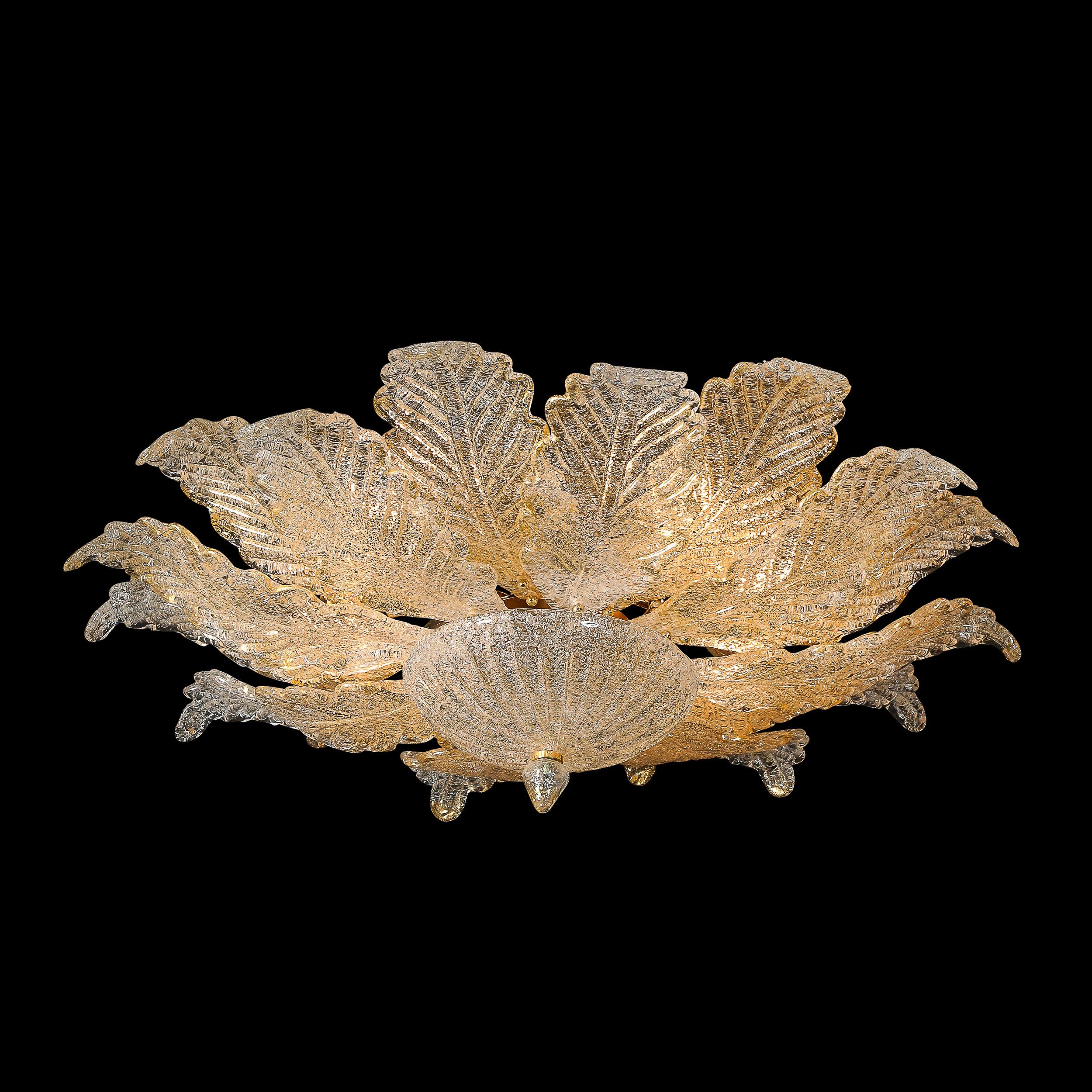 Illuminate your space with this Modernist Hand-Blown Mottled Murano Glass Acanthus Flush Mount Chandelier, adorned with 24 Karat Gold Flecks, crafted in Italy in the 21st century. This stunning chandelier showcases the unparalleled craftsmanship of