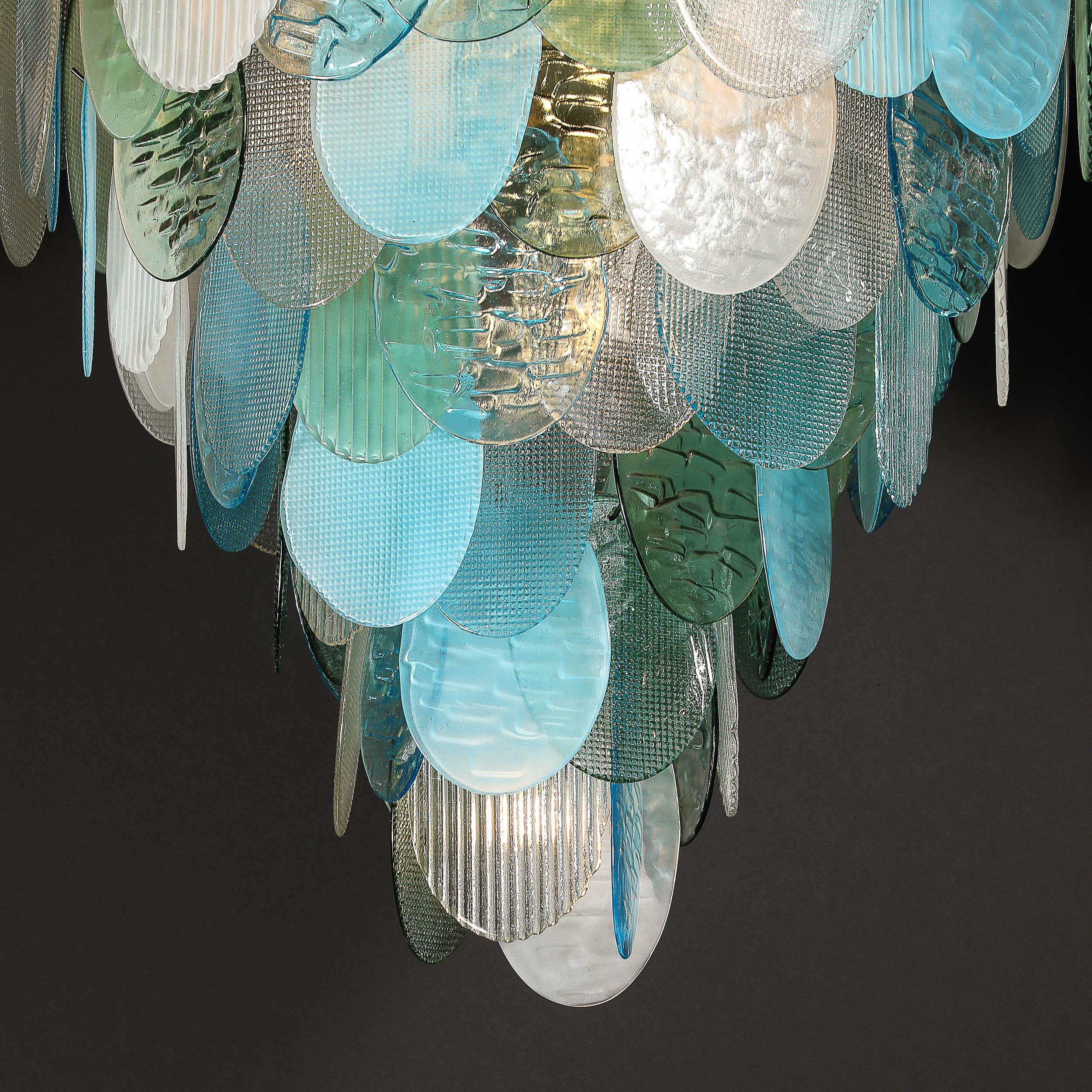 italien Lustre moderniste à 7 branches en forme de disque texturé en aigue-marine mélangée, soufflé à la main par Murano en vente