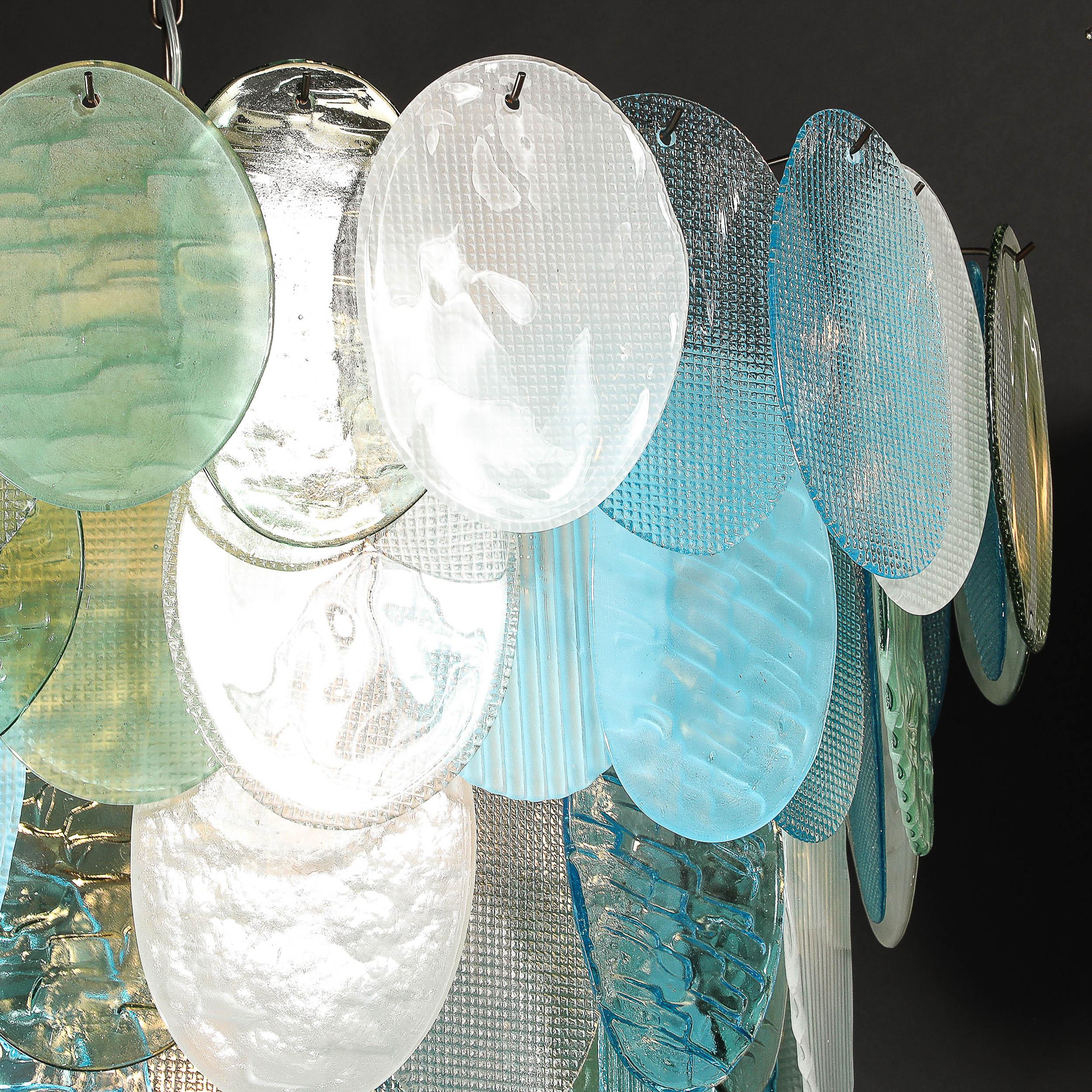 Lustre moderniste à 7 branches en forme de disque texturé en aigue-marine mélangée, soufflé à la main par Murano Excellent état - En vente à New York, NY
