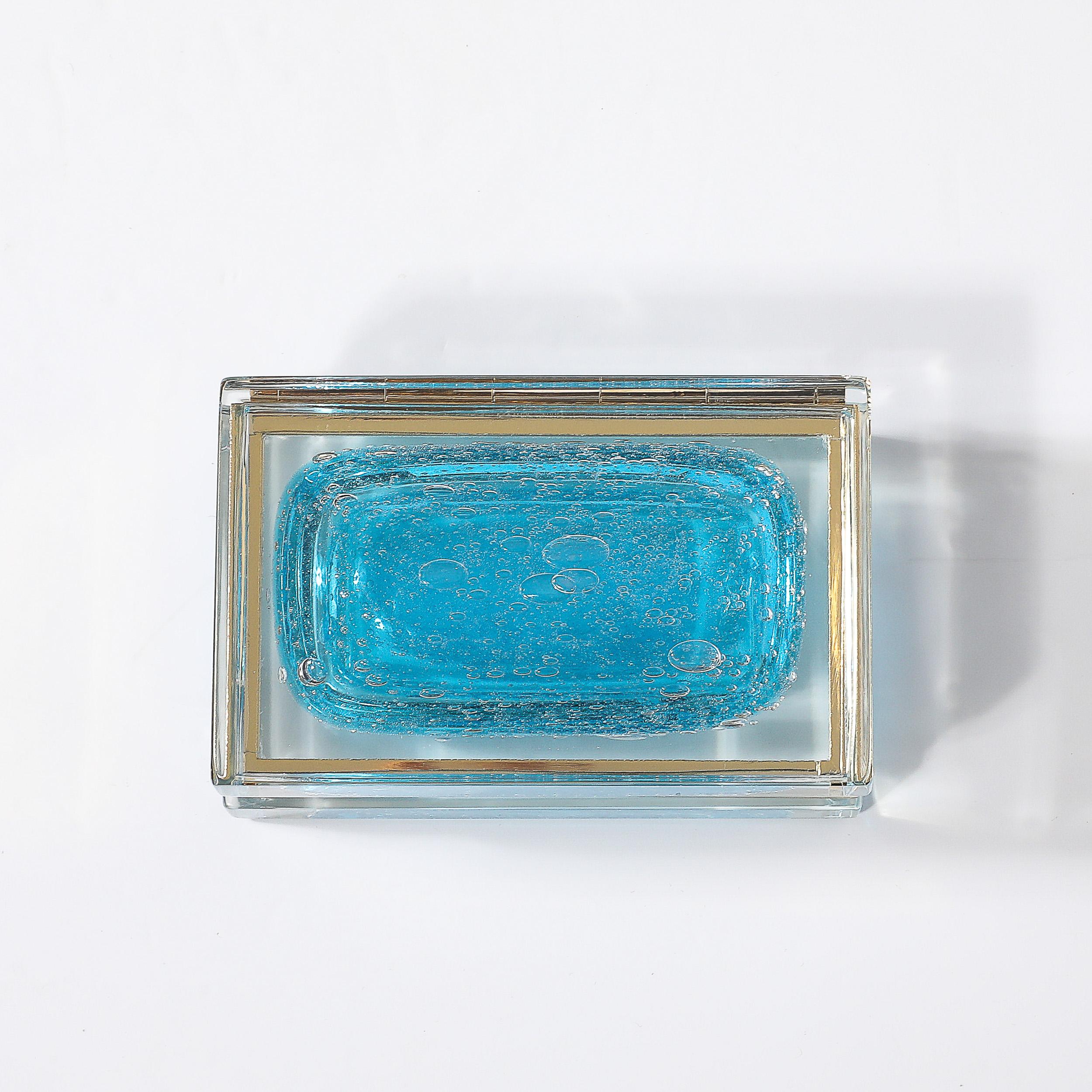 This Modernist Hand-Blown Murano Glass Box in ultramarine is a stunning example of craftsmanship and design innovation from Murano, Italy. Handmade in the 21st century using traditional Venetian glassmaking techniques, this piece combines vibrant