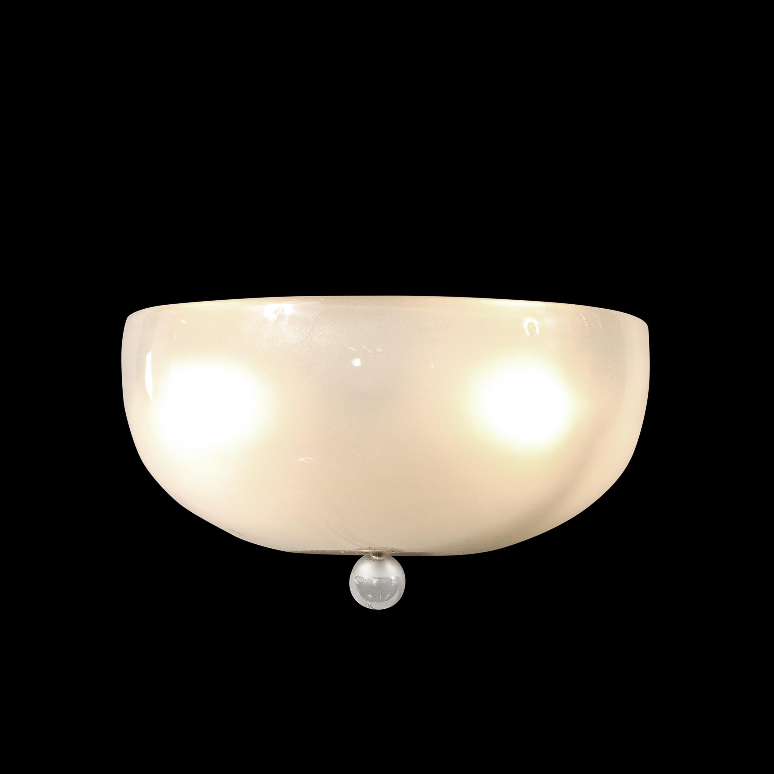 Adorn your walls with the exquisite beauty of the Modernist Hand-Blown Murano Glass Sconce, detailed with 24-karat white gold flecks and complemented by sleek nickel fittings. Crafted in Italy during the 20th century, this sconce showcases the