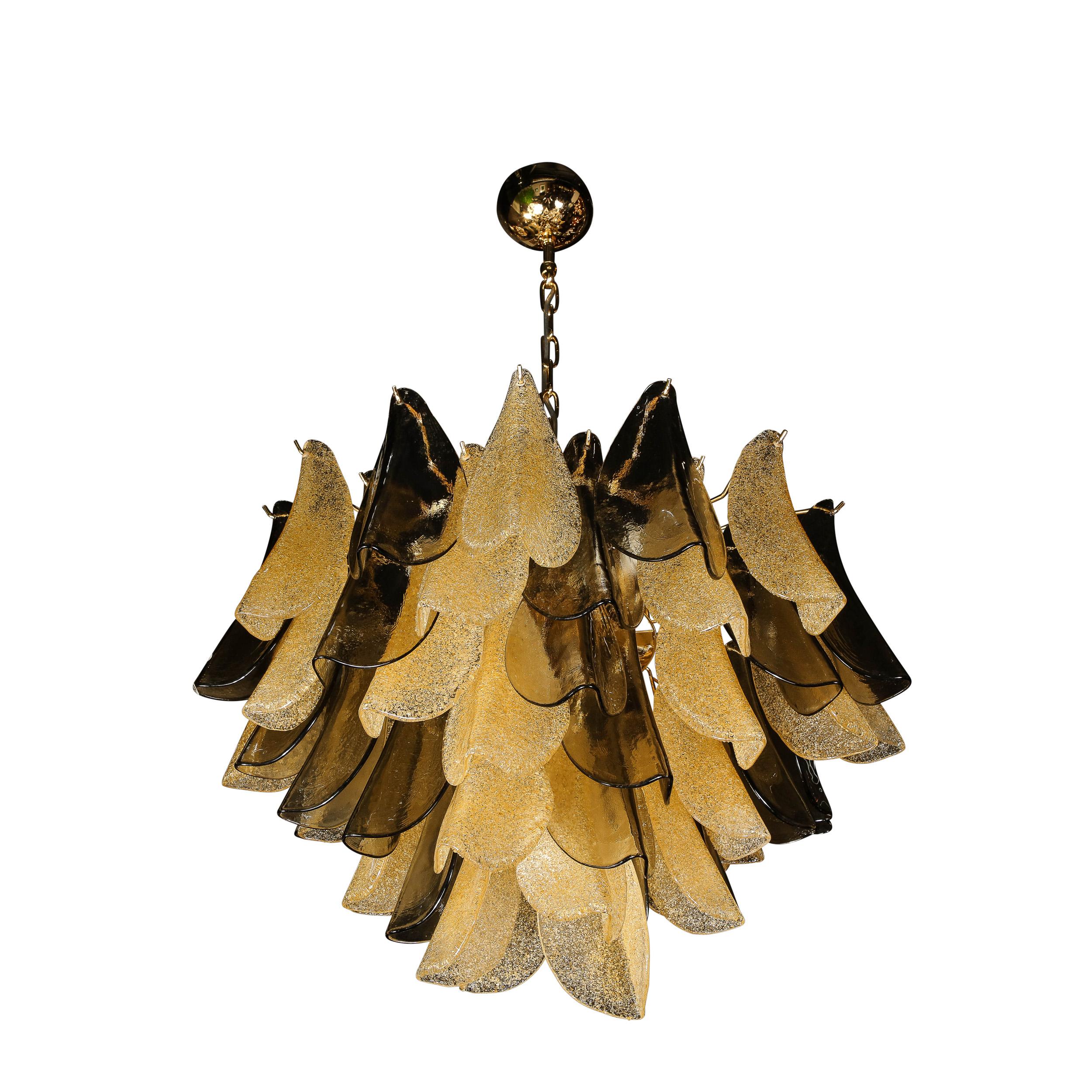 This refined and sophisticated chandelier was realized in Murano, Italy- the islands off the coast of Venice renowned for centuries for their superlative quality glass production. It offers an abundance of hand-blown Murano glass shades in a Smoked