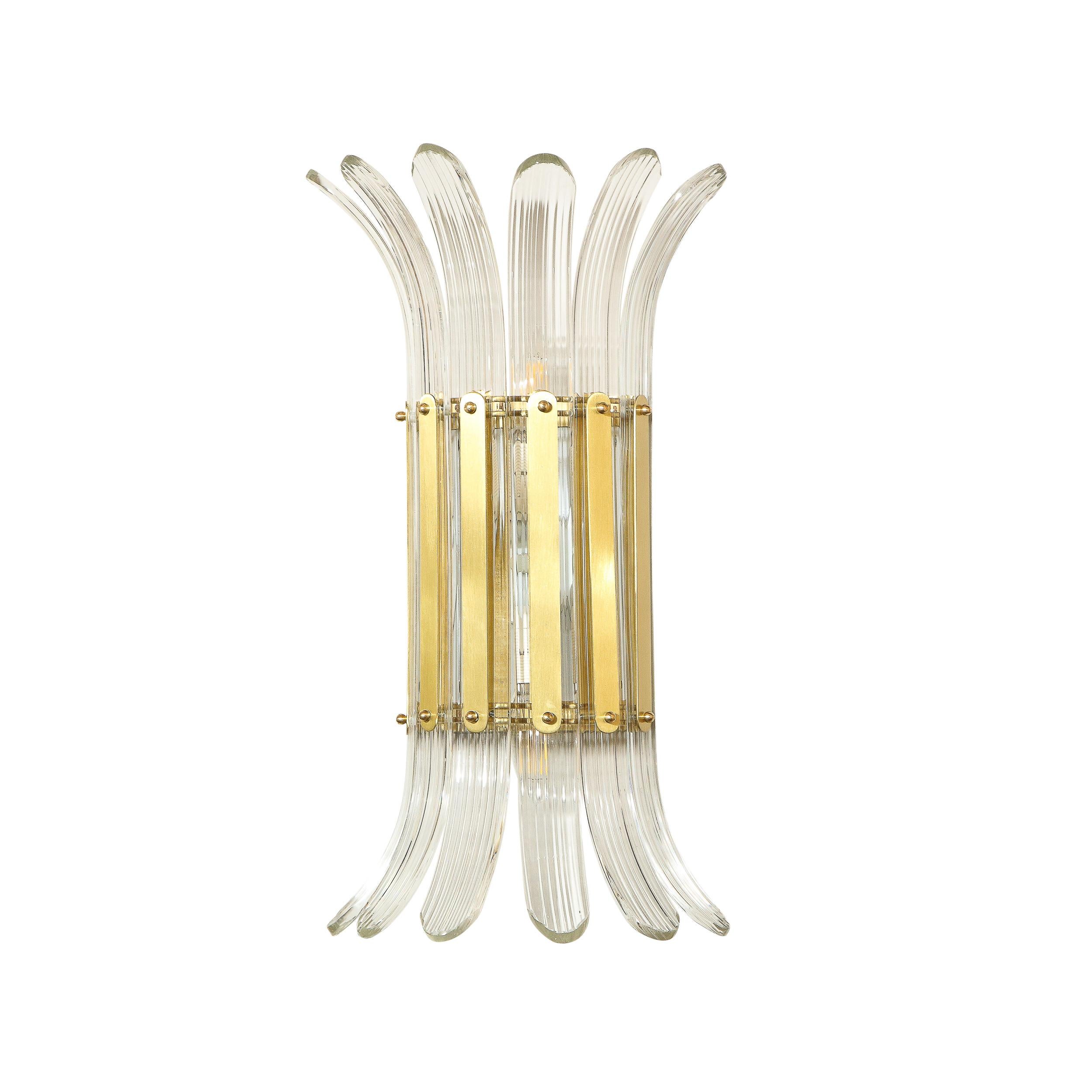 This stunning pair of sconces were handblown in Murano, Italy- the island off the coast of Venice renowned for centuries for its superlative glass production. It features two rows of striated handblown Murano curved rectangular shades with rounded