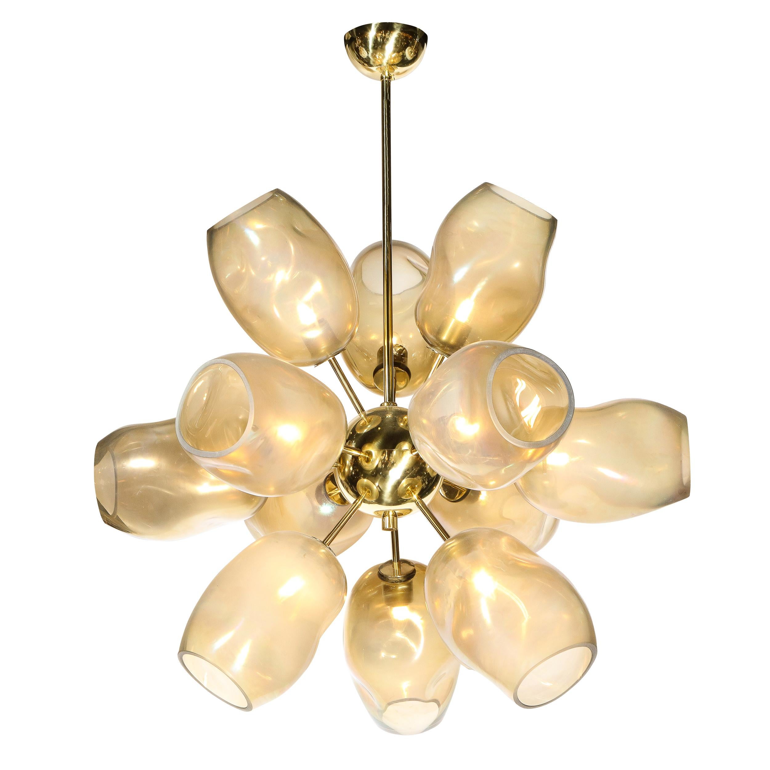 Exclusive to High Style Deco, this stunning modernist chandelier was handblown in Murano, Italy- the island off the coast of Venice renowned for centuries for its superlative glass production. This beautiful fixture offers twelve lustrous polished