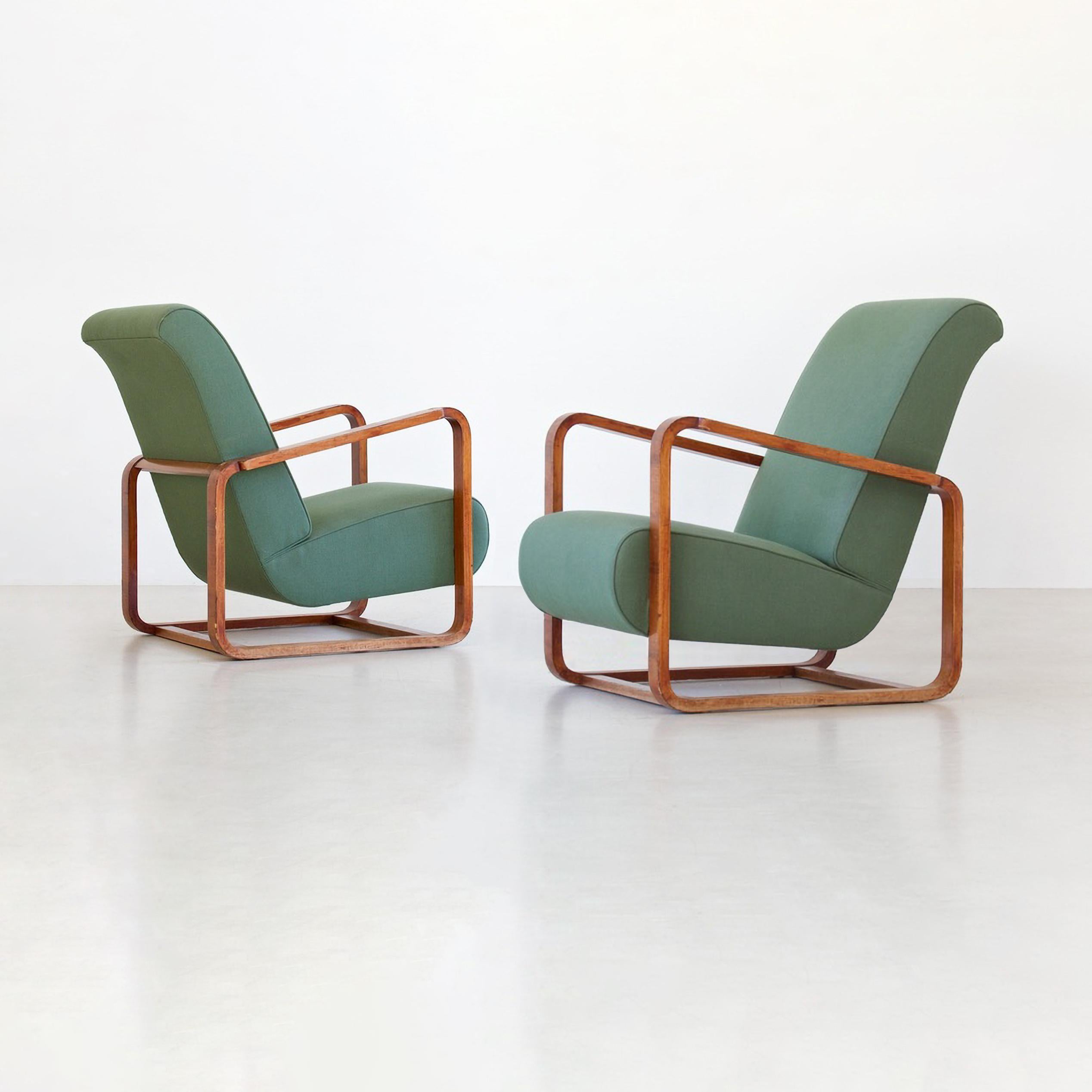 Elegant modernist high-back armchairs with walnut-veneered frame and original upholstery, Austria, circa 1930

These armchairs are restored on request and available in different amounts, customizable. Delivery time c. 10-12 weeks.
