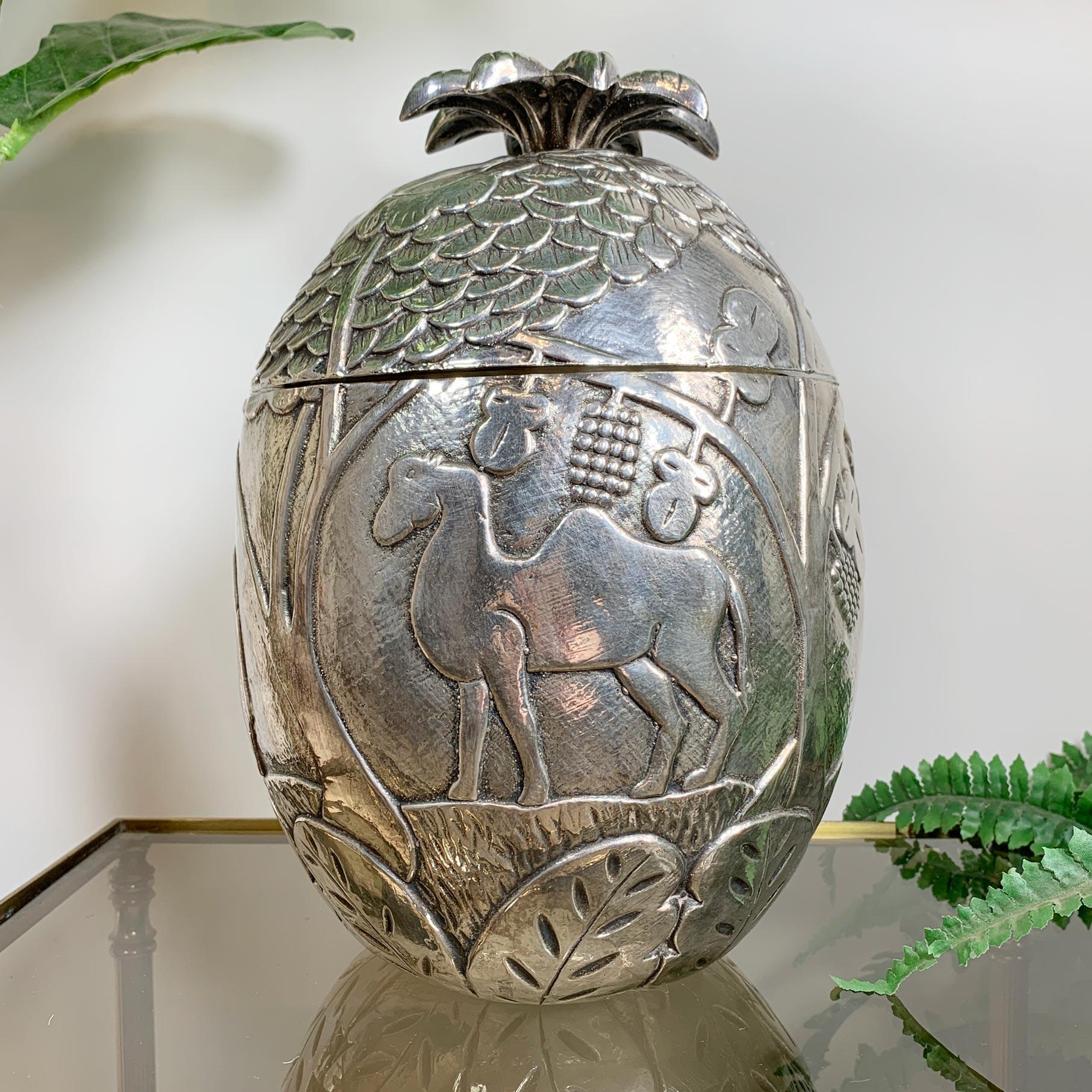 An exceptional and very rare silver-plated modernist Ice Bucket, attributed to the works of the pioneering modernist French artist Marc Chagall.

The Ice Bucket is adorned with various embossed images of Deer, Elephant, Owl and Camel, interspersed