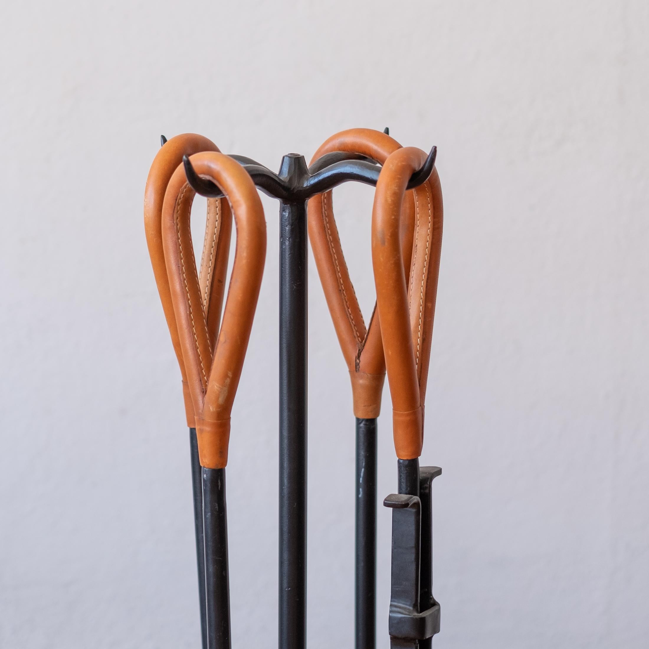 Late 20th Century Modernist Iron and Leather Handle Fire Place Tool Set After Jacques Adnet