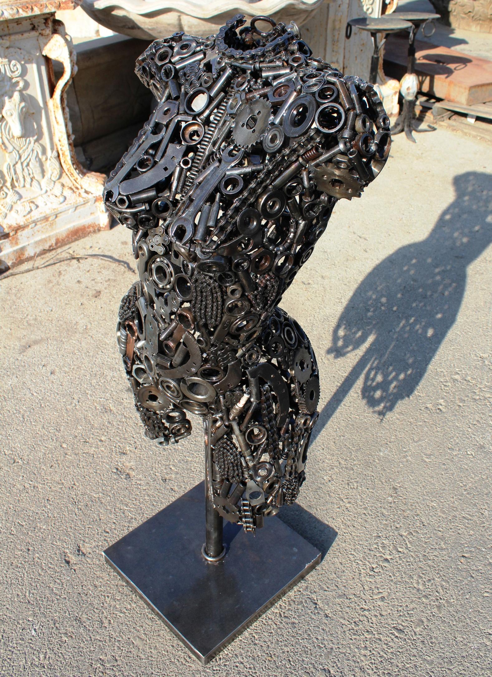 metal torso sculpture