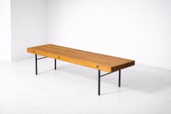 Modernist Italian bench in solid wood and metal with brass tips
