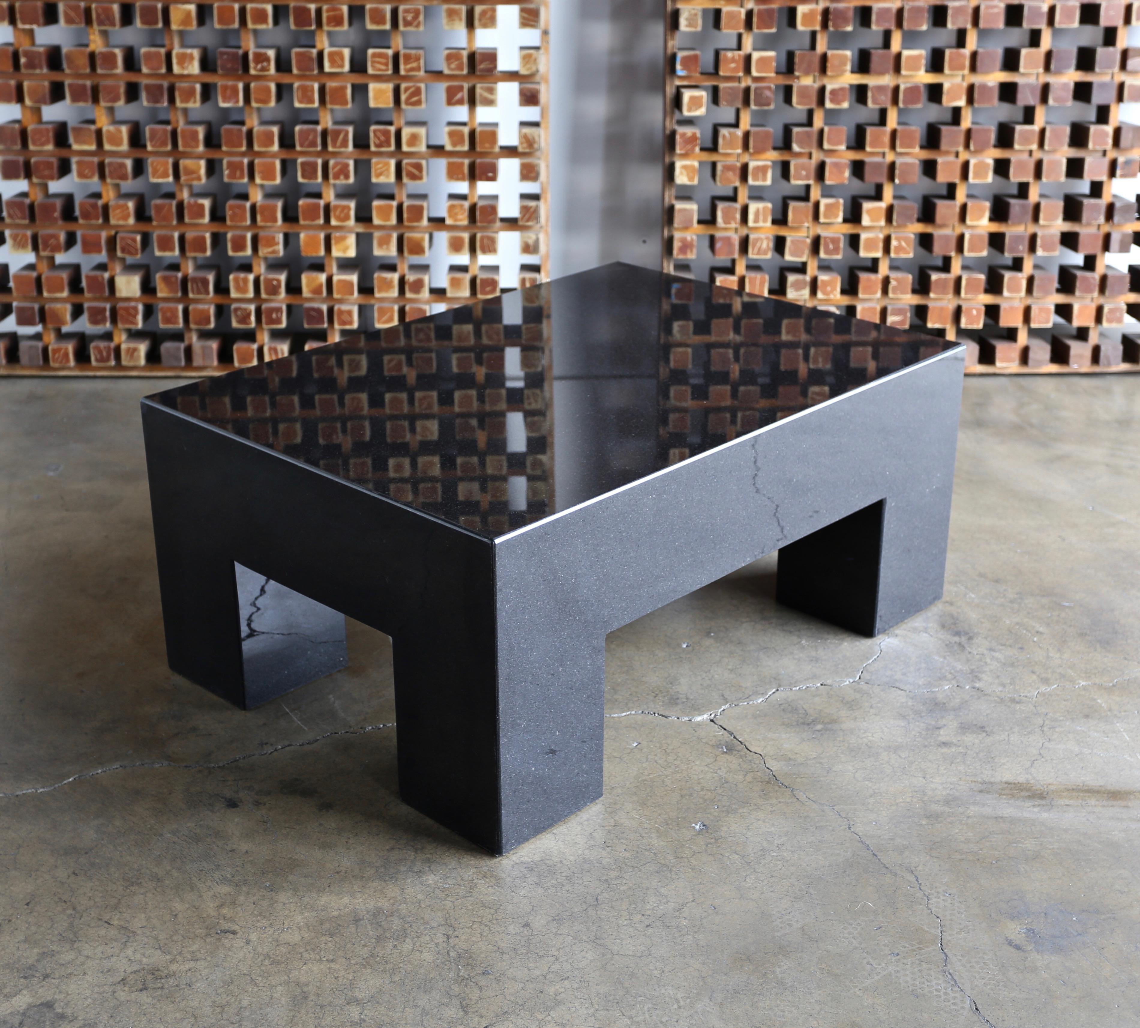 Modernist Italian polished granite coffee table, circa 1980.