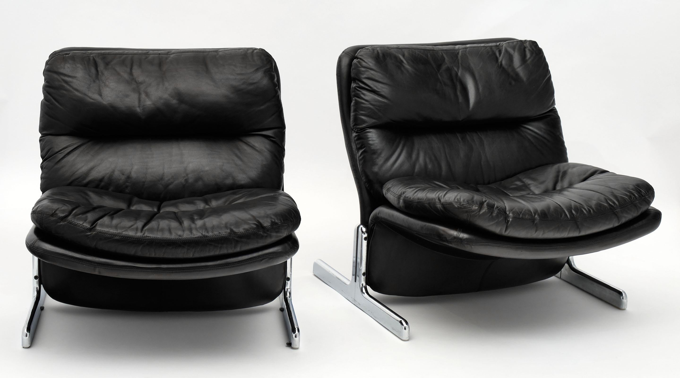 Italian leather modernist Brunati armchairs designed by Giampiero Vitelli and Titina Ammanati for Brunati. High density foam padding; original black leather upholstery, and a chromed steel structure make these chairs incredibly comfortable and