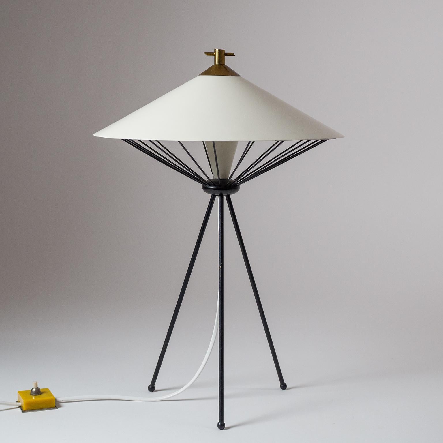Very unique Italian sputnik table or desk lamp with a tripod base. The 