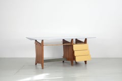 Modernist Italien writing desk with drawers and light blue Formica table top.
