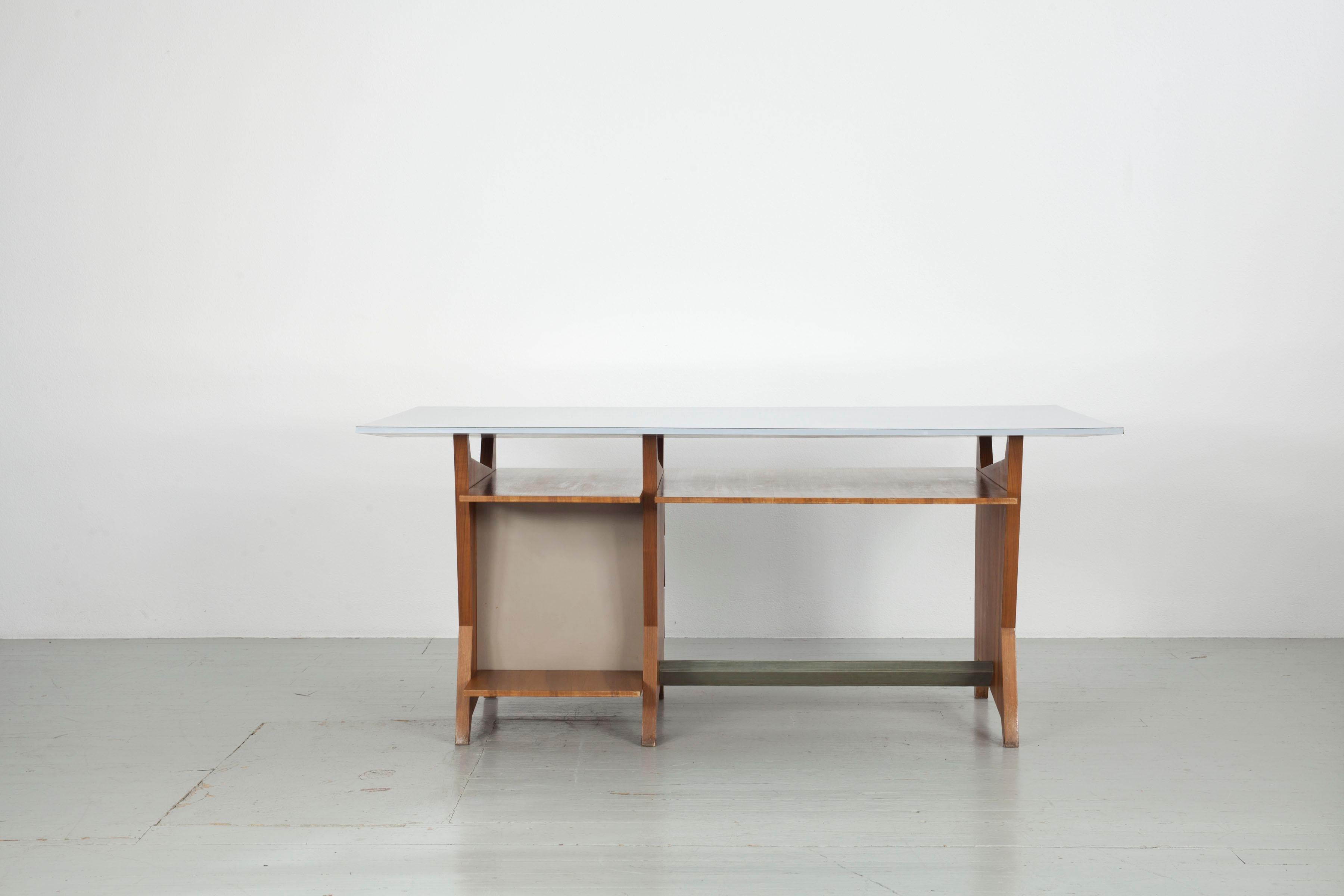 Mid-20th Century Modernist Italien writing desk with drawers and light blue Formica table top.  For Sale