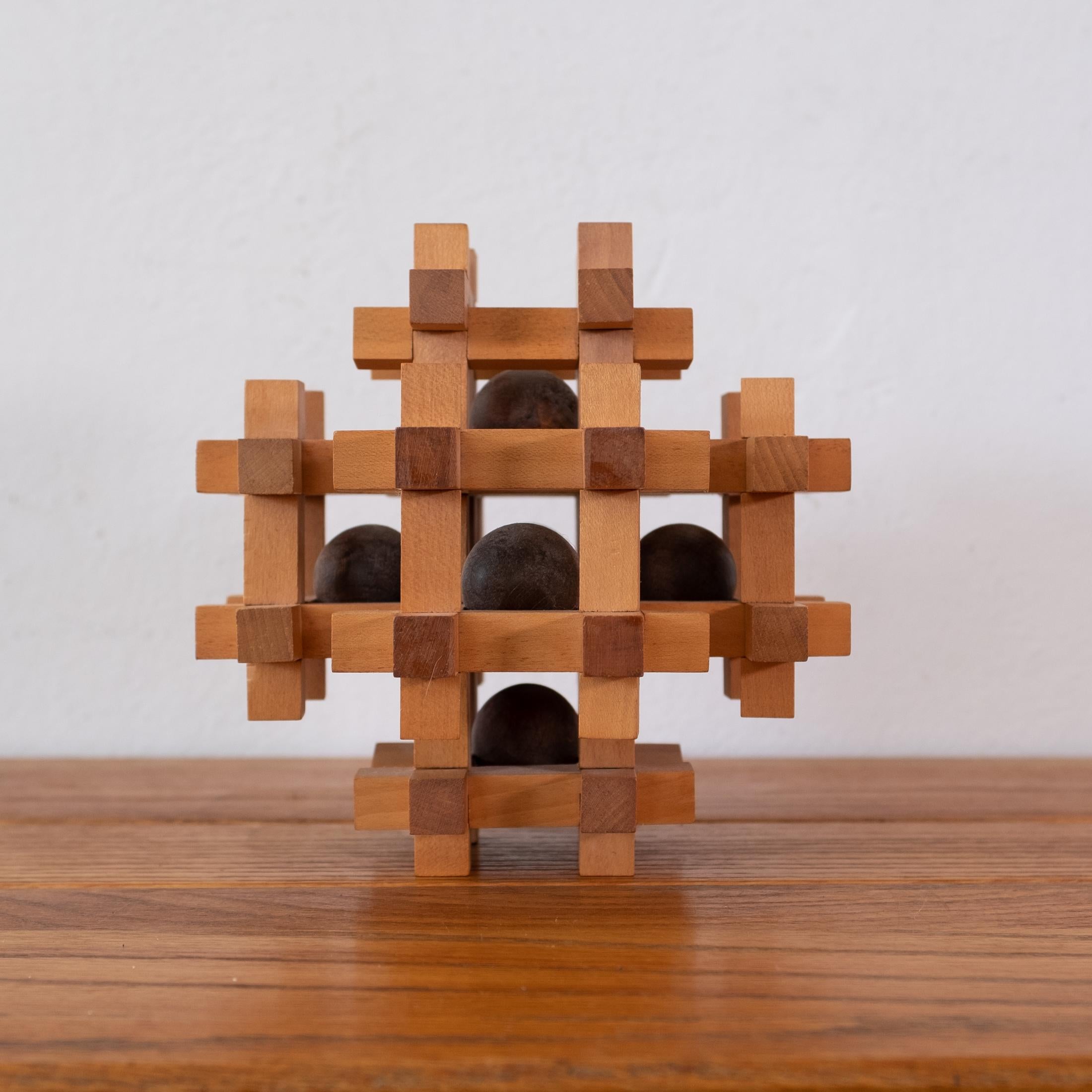 Wood puzzle sculpture by Sori Yanagi for Kumiki. Yanagi designed just a few puzzles for the company. Japan, 1960s

Sori was the son of the Japanese Folk Crafts Museum founder, Soetsu Yanagi. Having studied both art and architecture, he pioneered