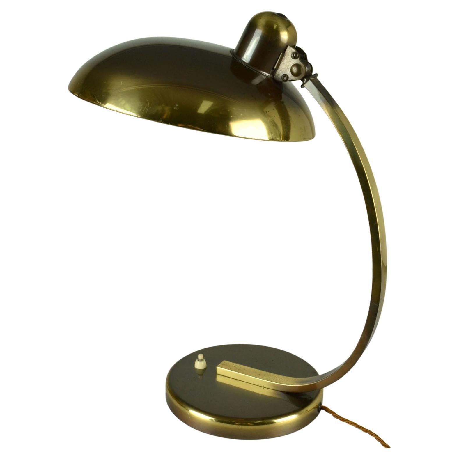 Modernist brass Bauhaus 'President' table or desk lamps with original patina and adjustable shade. Designed by Christian Dell, 1930's manufactured by Kaiser Leuchten, Germany, brass – CHF 1390. 