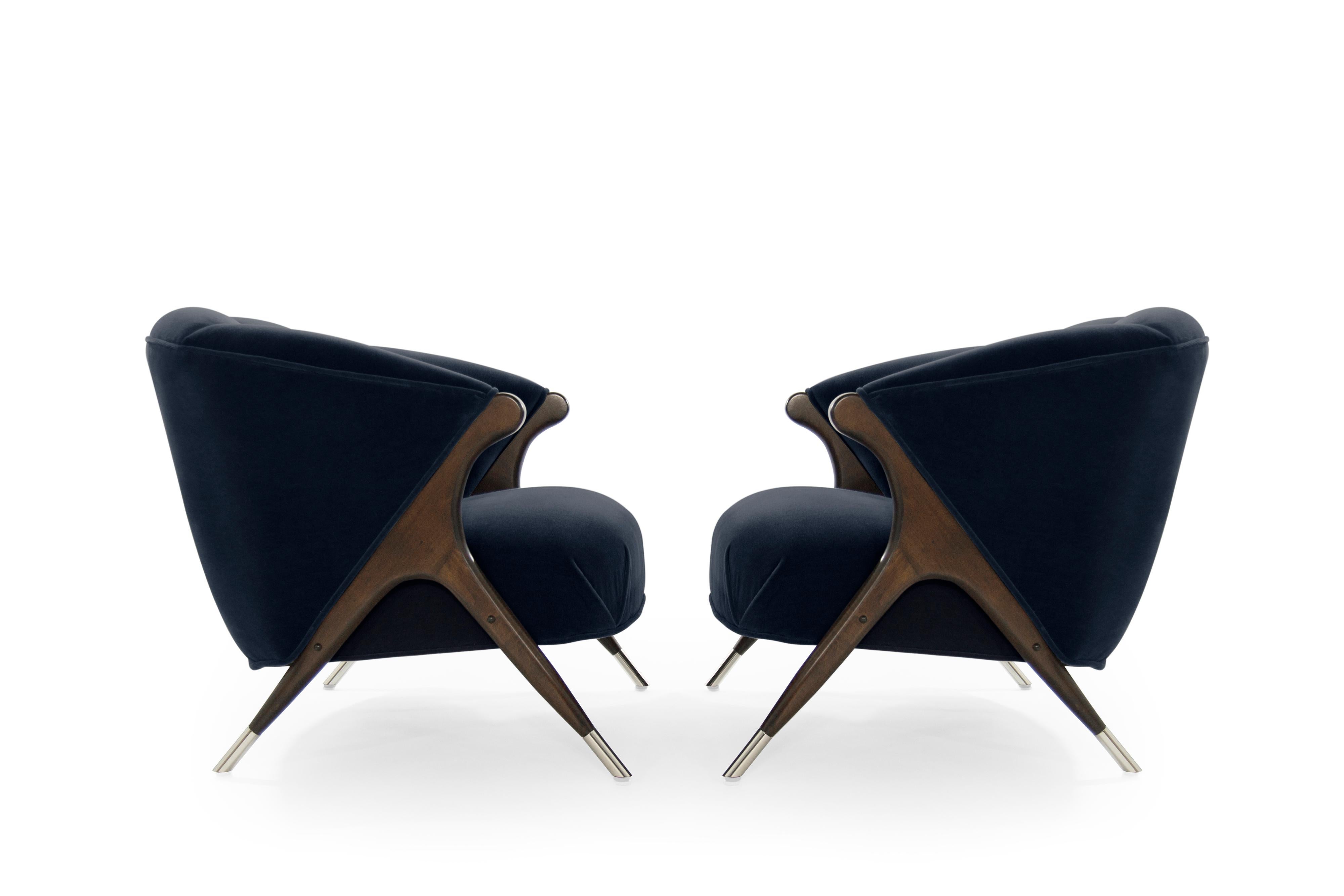 Stunning and rare pair of lounge chair by Karpen of California, circa 1950s.

Re-upholstered in great plains midnight cotton velvet by Holly Hunt. Sculptural maple legs restored to their original finish, newly nickel-plated sabots.
 