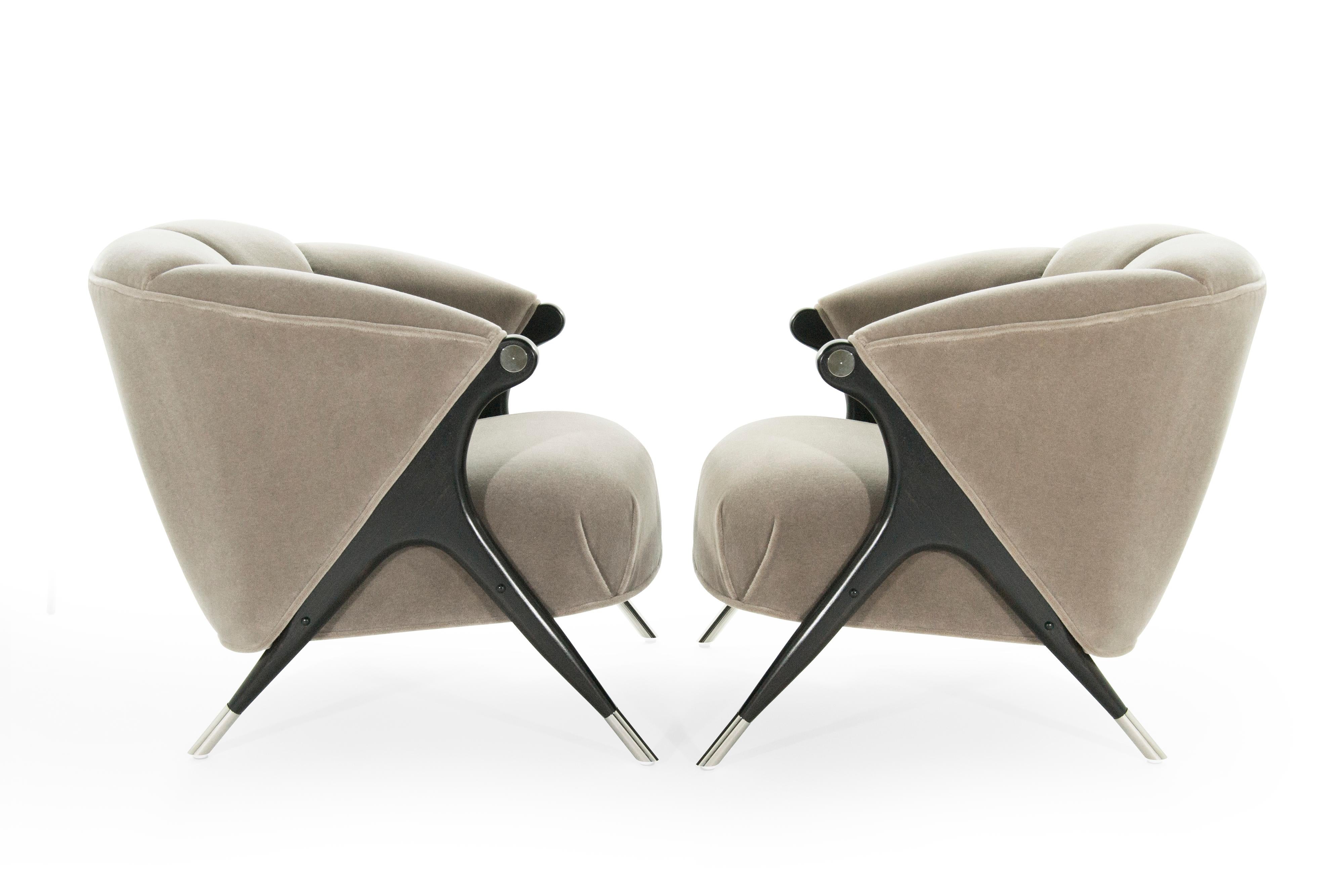 Stunning and rare pair of lounge chair by Karpen of California, circa 1950s.

Newly upholstered in taupe mohair, sculptural maple legs newly restored to their original ebonized finish, newly nickel plated sabots and arm hardware.

Priced as pair.